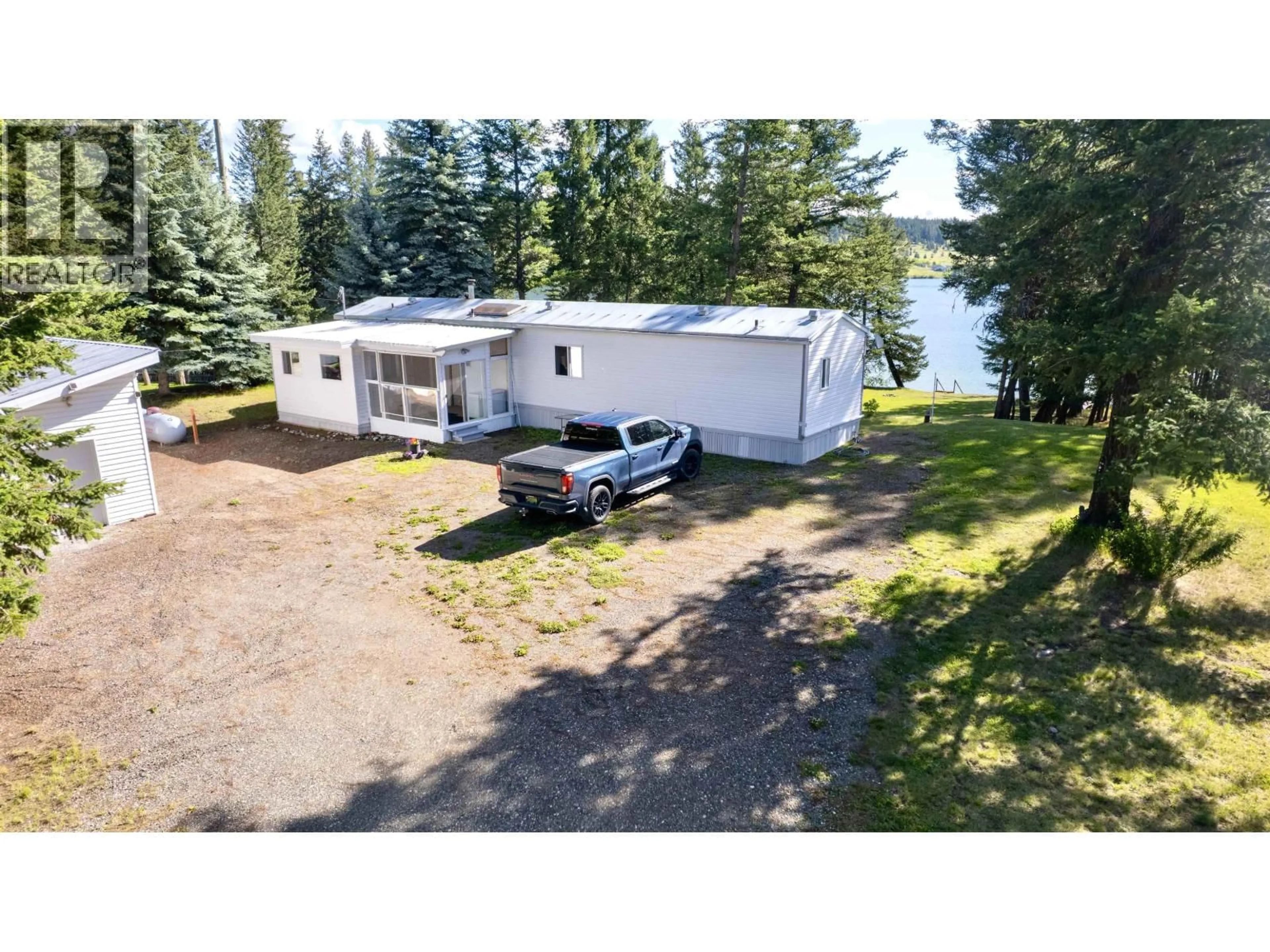 A pic from outside/outdoor area/front of a property/back of a property/a pic from drone, water/lake/river/ocean view for 3425 CHIMNEY LAKE ROAD, Williams Lake British Columbia V2G5J4