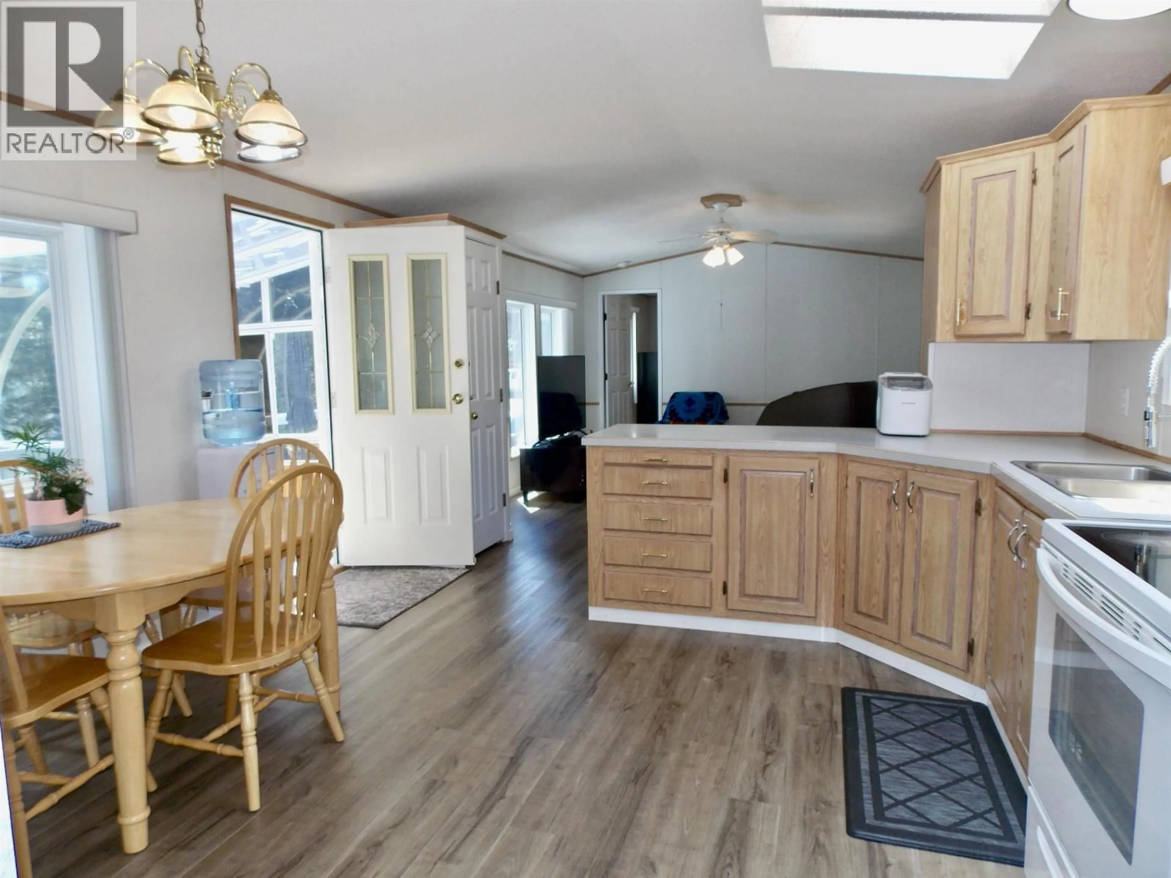 Open concept kitchen, wood/laminate floor for 3425 CHIMNEY LAKE ROAD, Williams Lake British Columbia V2G5J4