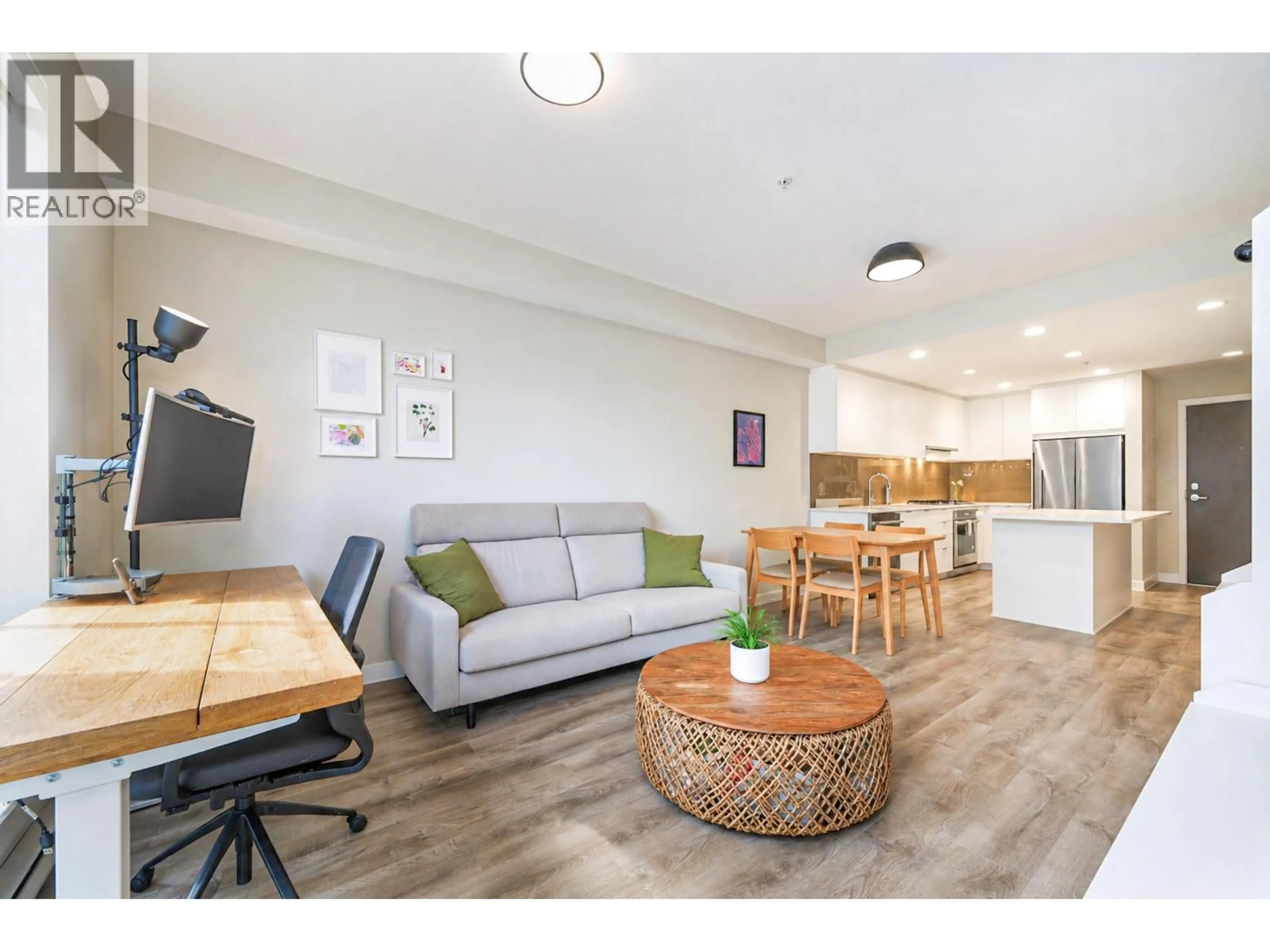 Living room with furniture, wood/laminate floor for 307 - 615 COTTONWOOD AVENUE, Coquitlam British Columbia V3J0N4