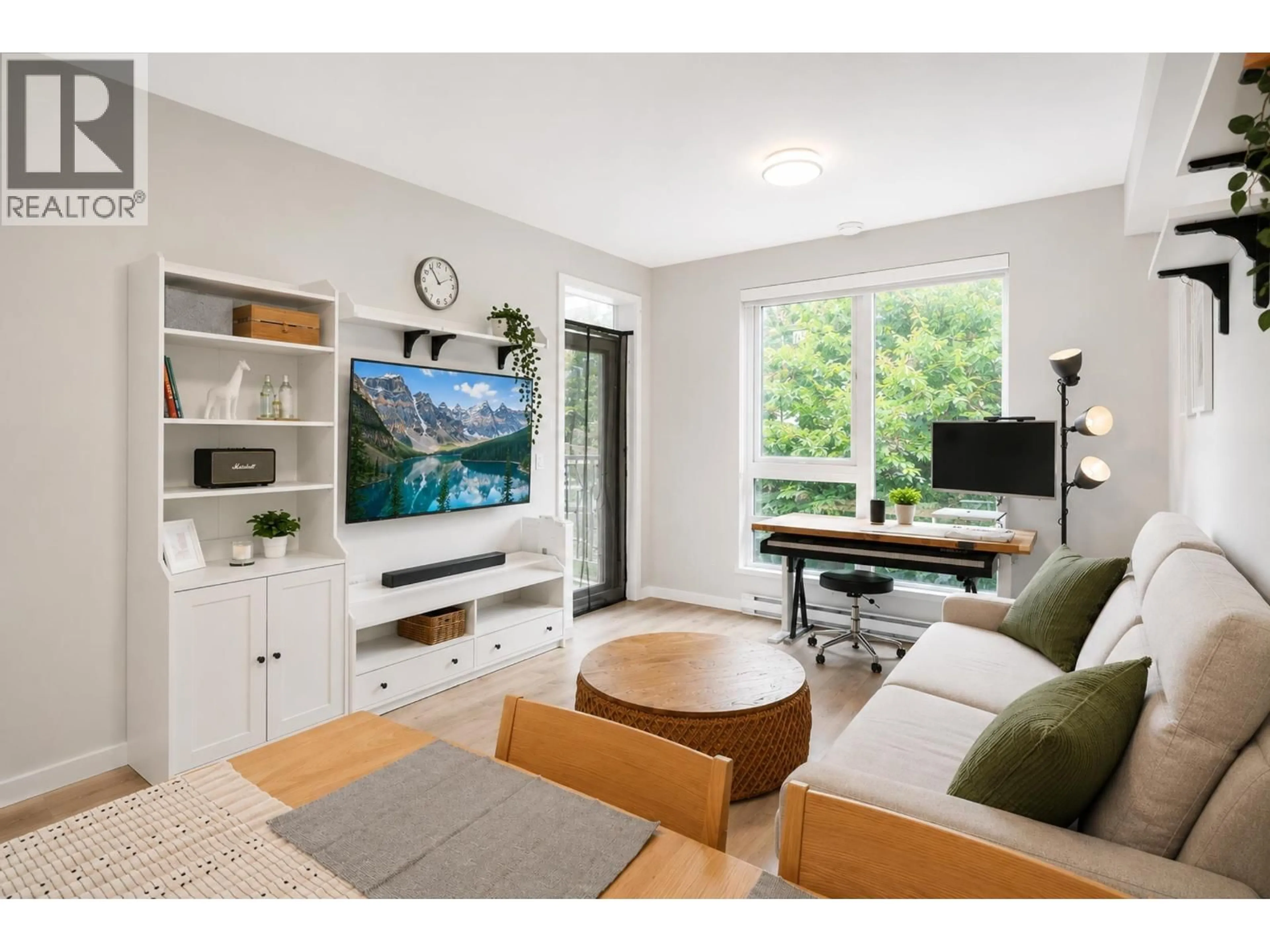 Living room with furniture, wood/laminate floor for 307 - 615 COTTONWOOD AVENUE, Coquitlam British Columbia V3J0N4