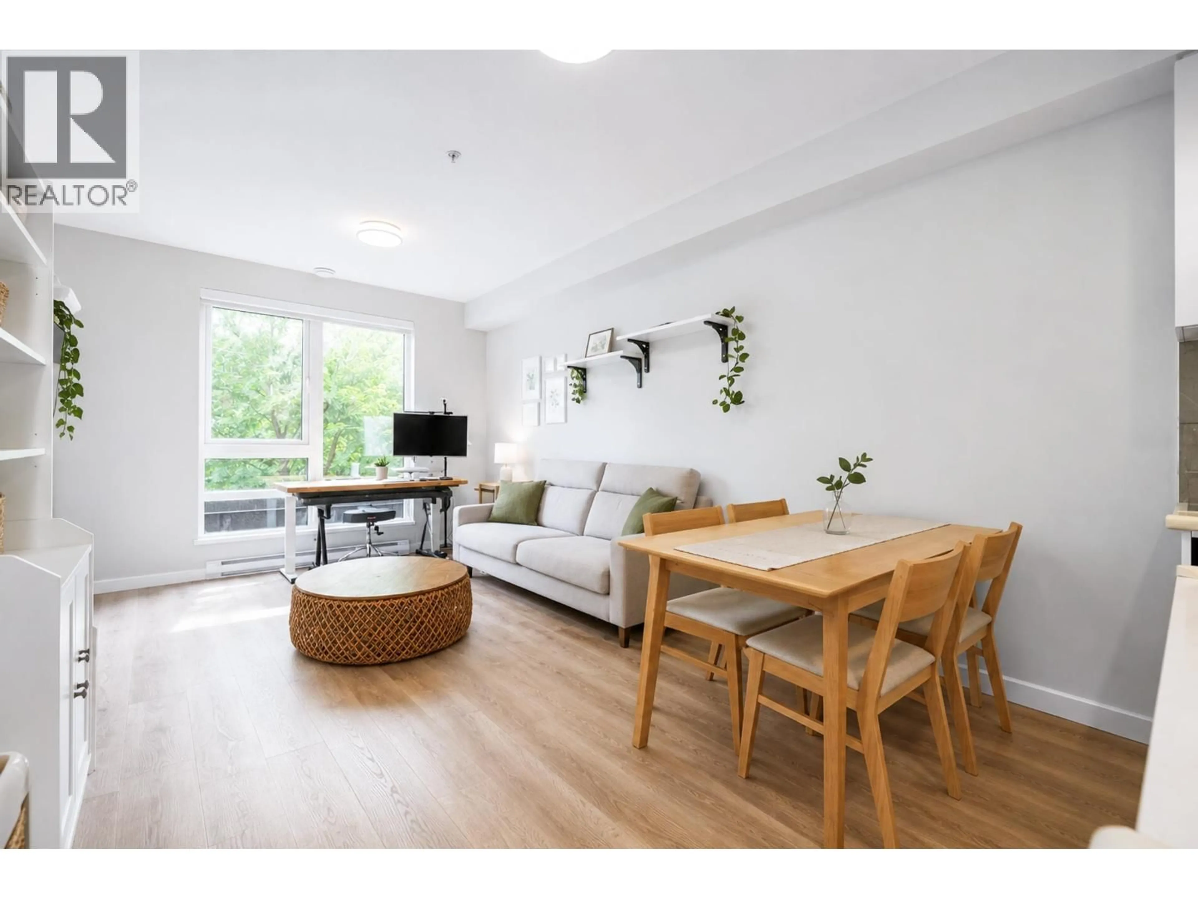 Living room with furniture, wood/laminate floor for 307 - 615 COTTONWOOD AVENUE, Coquitlam British Columbia V3J0N4