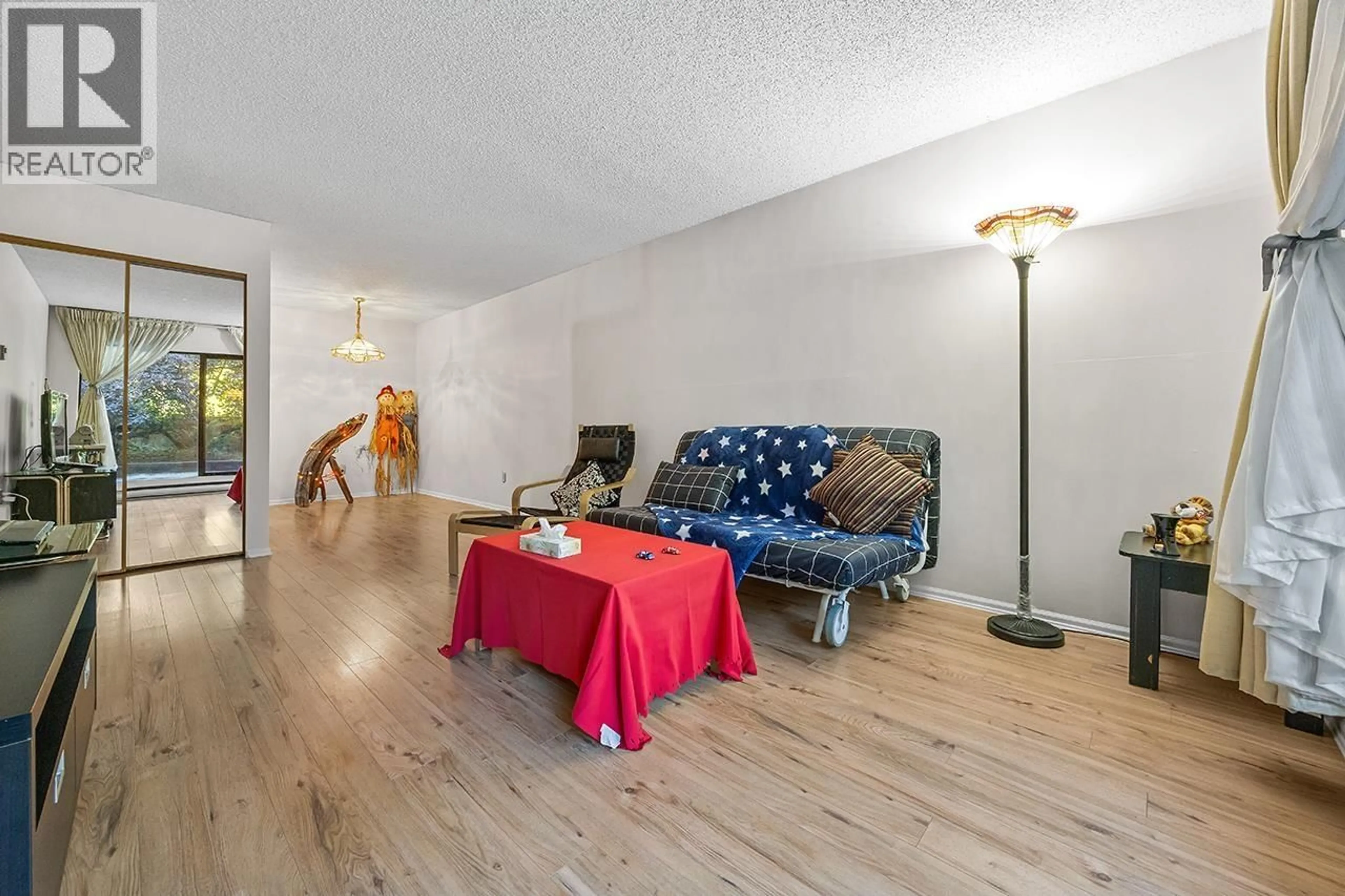 Living room with furniture, wood/laminate floor for 109 - 8231 GRANVILLE AVENUE, Richmond British Columbia V6Y3A4