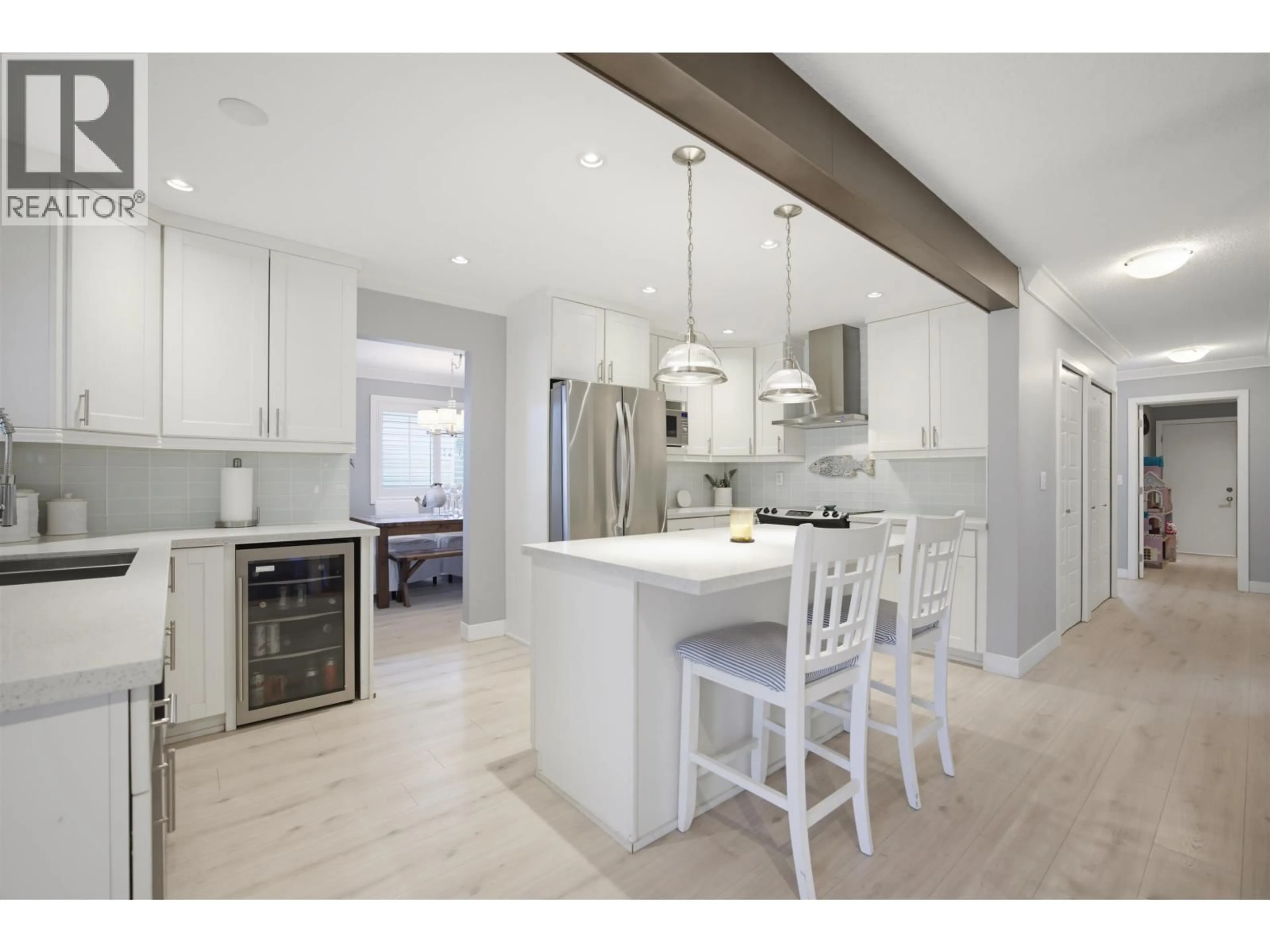 Open concept kitchen, wood/laminate floor for 19026 117B AVENUE, Pitt Meadows British Columbia V3Y1Y1
