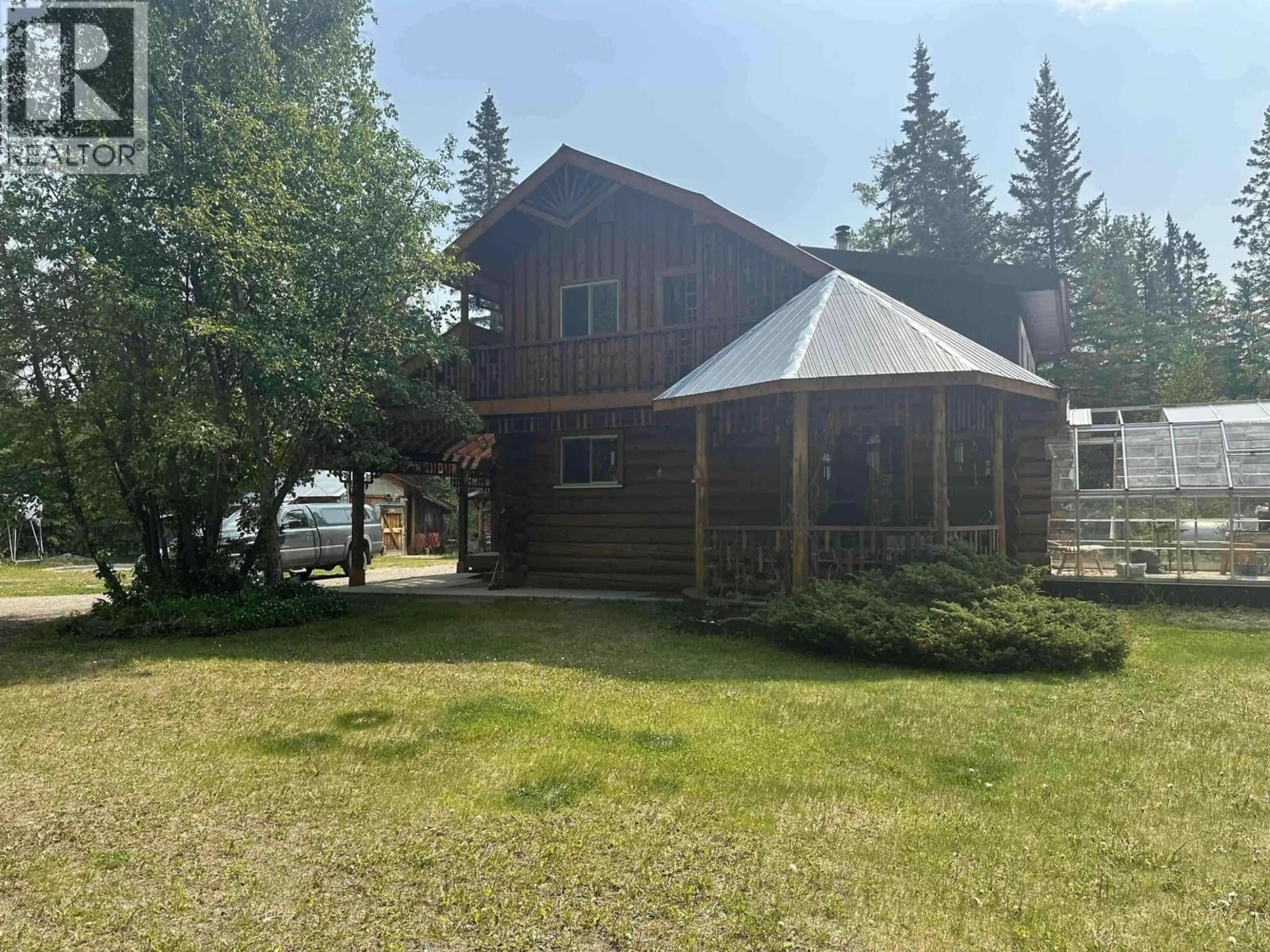 A pic from outside/outdoor area/front of a property/back of a property/a pic from drone, mountain view for 21023 TOMPKINS ROAD, Hudsons Hope British Columbia V0C1V0