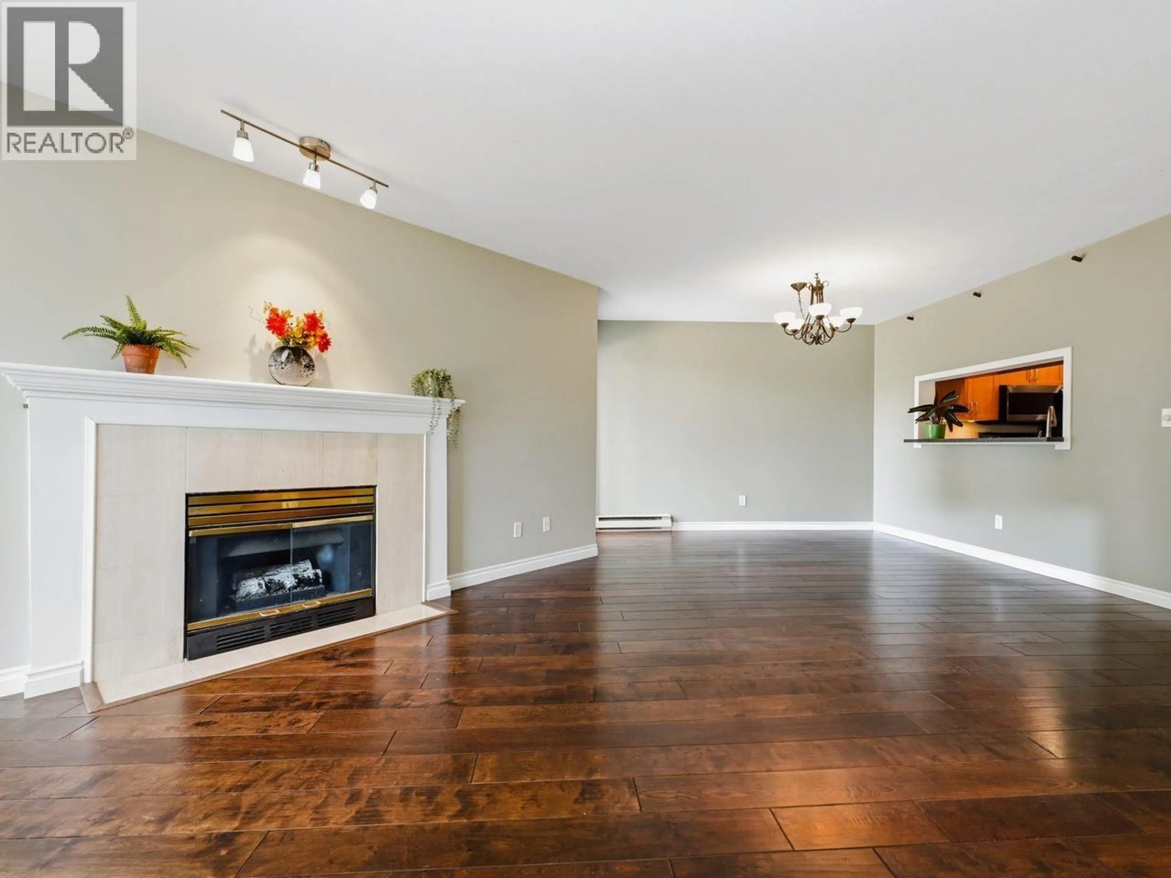 Living room with furniture, wood/laminate floor for 117 - 7437 MOFFATT ROAD, Richmond British Columbia V6Y3V9