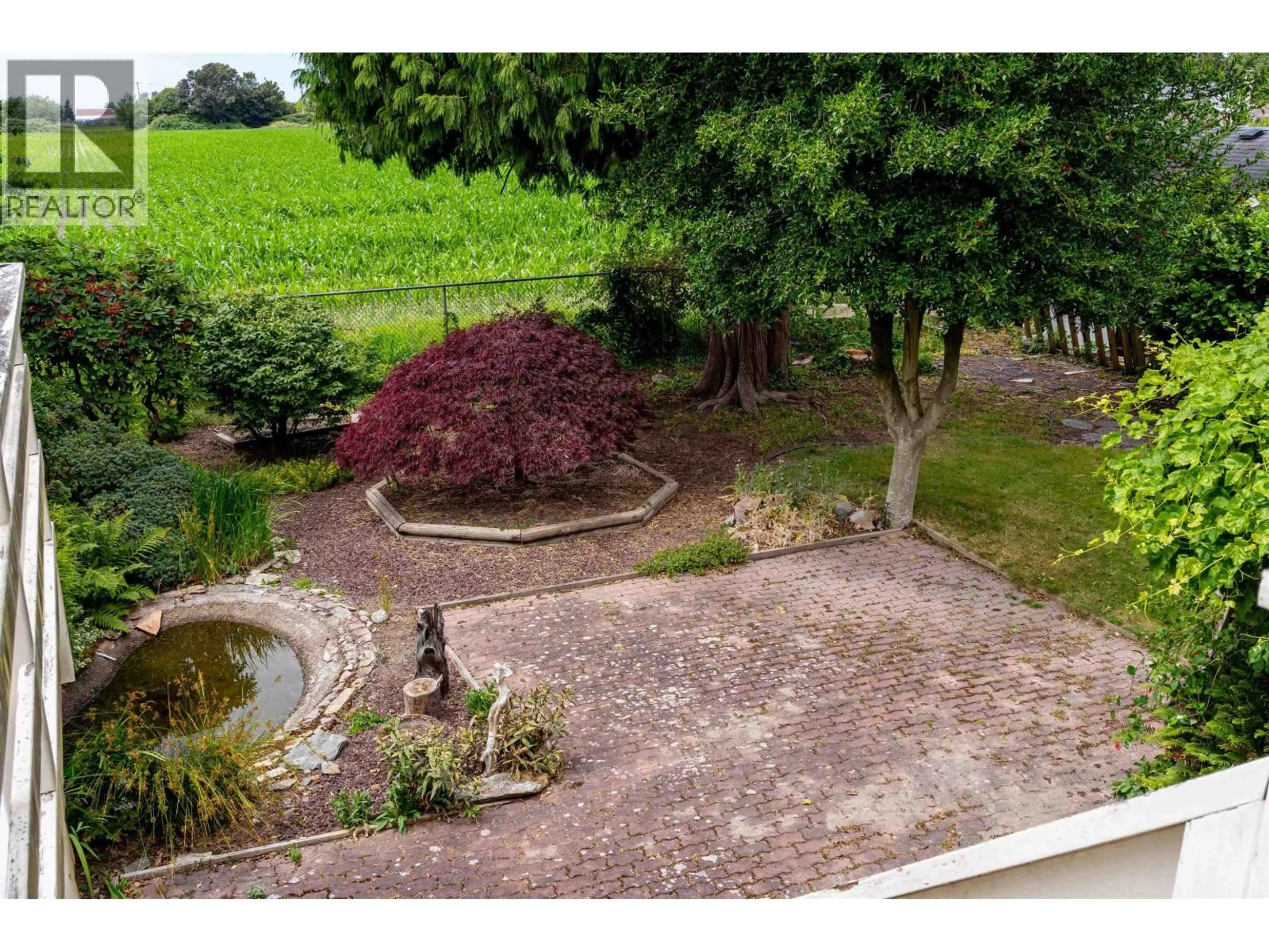A pic from outside/outdoor area/front of a property/back of a property/a pic from drone, water/lake/river/ocean view for 4351 48A STREET, Delta British Columbia V4K2P8