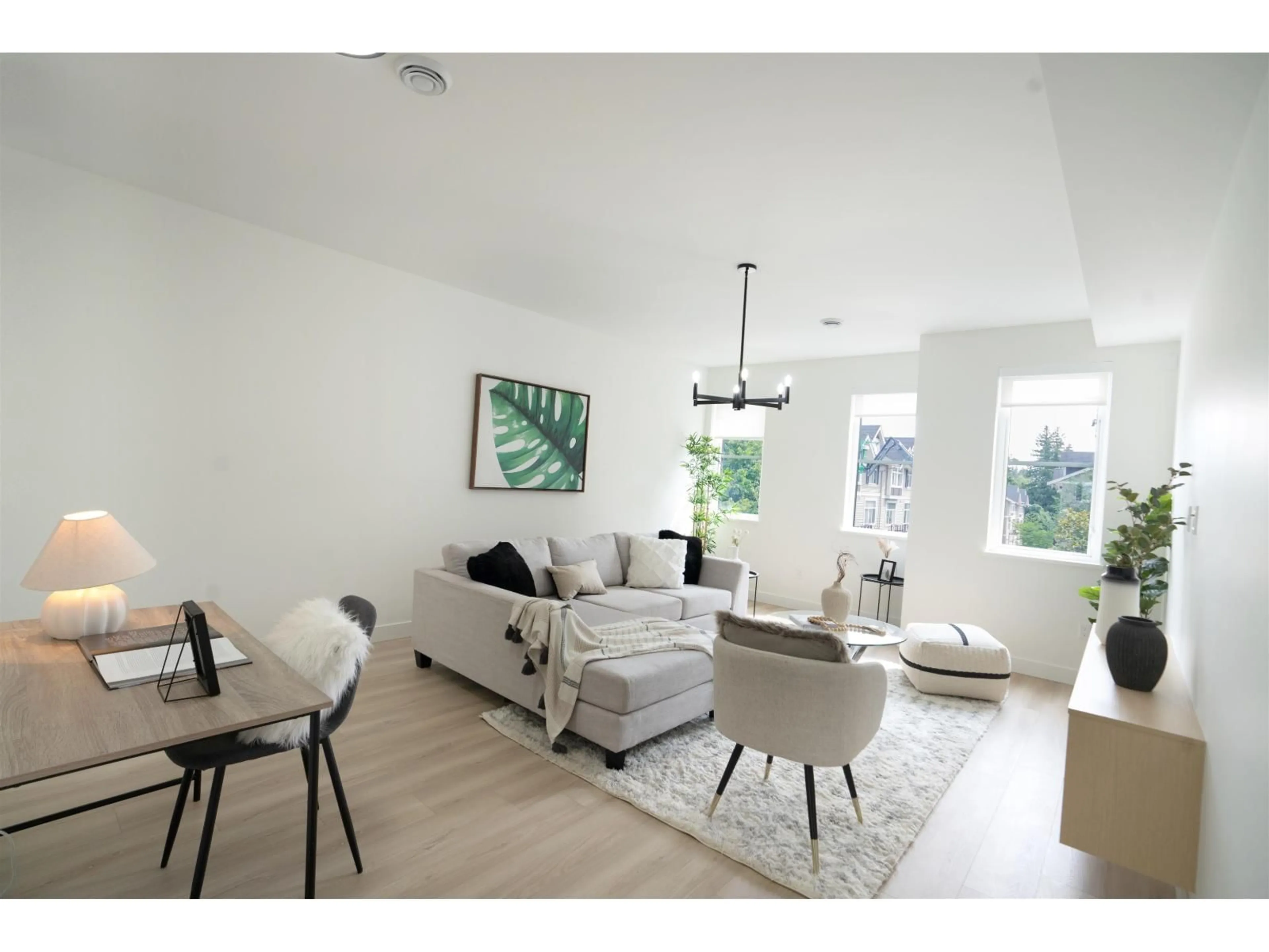 Living room with furniture, wood/laminate floor for 2 - 14311 60 AVENUE, Surrey British Columbia V3X2N4