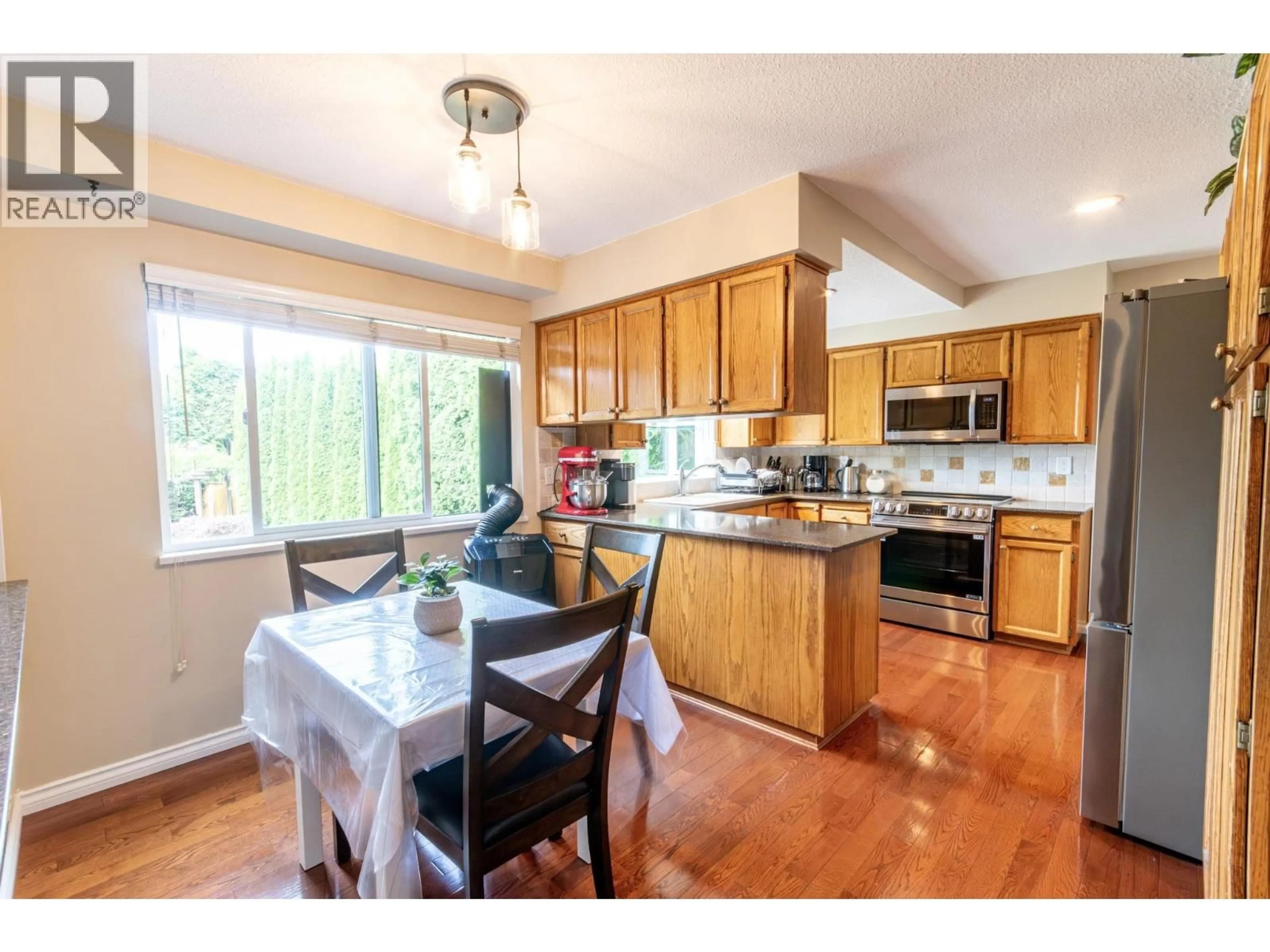 Open concept kitchen, wood/laminate floor for 1410 LANSDOWNE DRIVE, Coquitlam British Columbia V3E1Y4