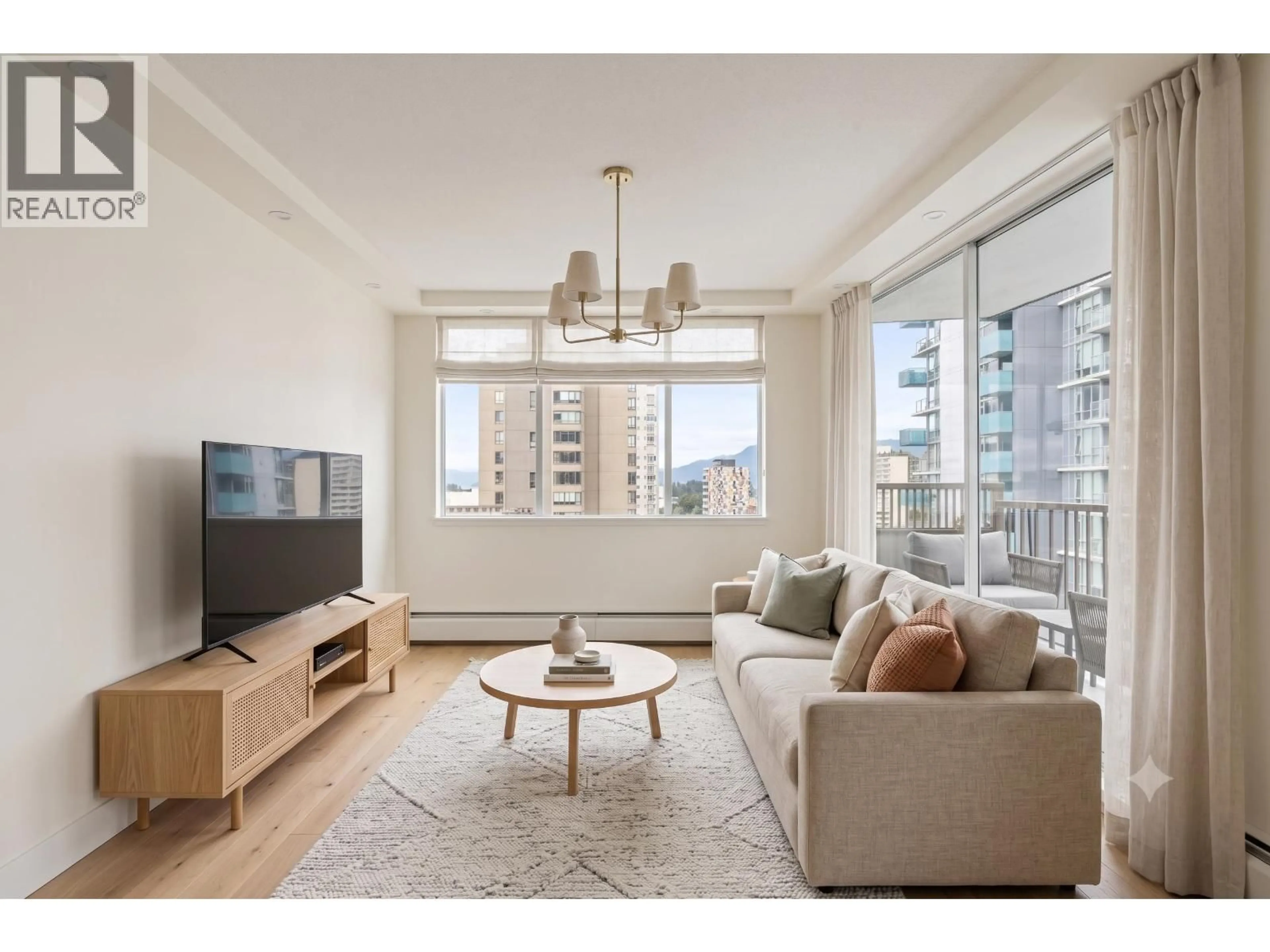 Living room with furniture, wood/laminate floor for 1004 - 1251 CARDERO STREET, Vancouver British Columbia V6G2H9