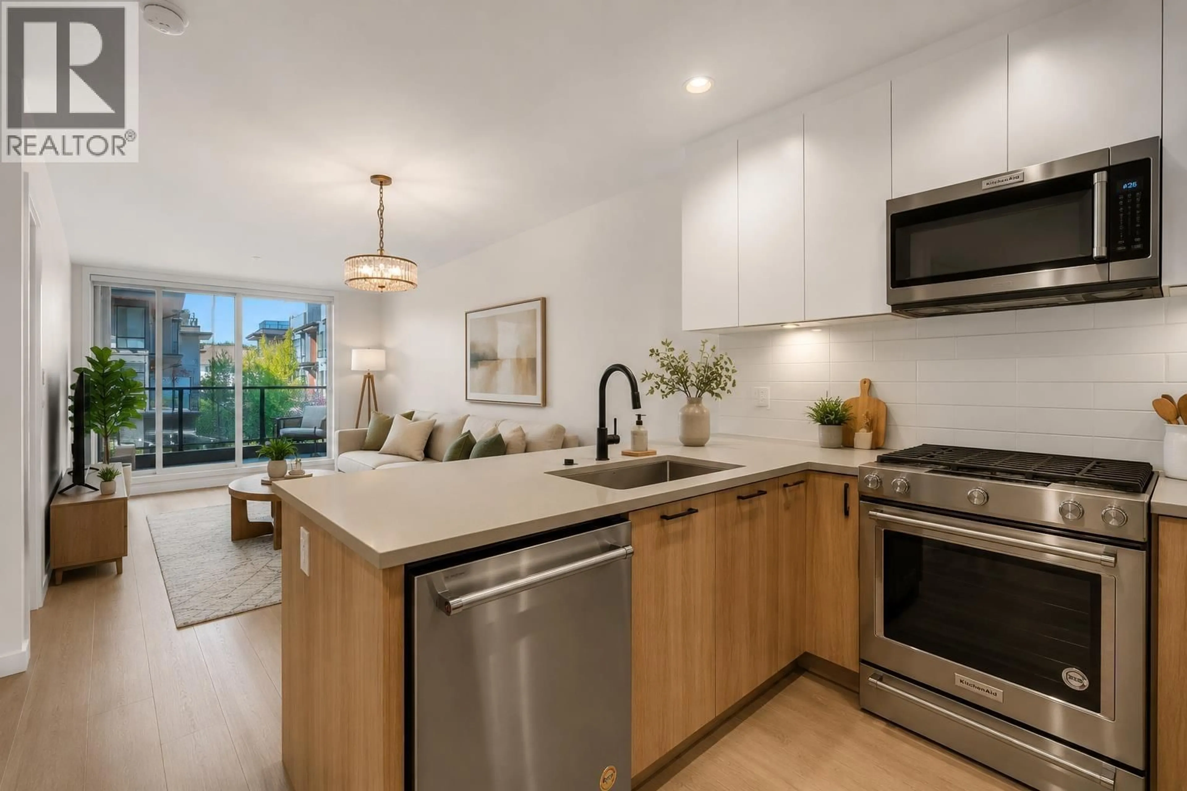 Open concept kitchen, unknown for 212 - 707 COMO LAKE AVENUE, Coquitlam British Columbia V3J0J5