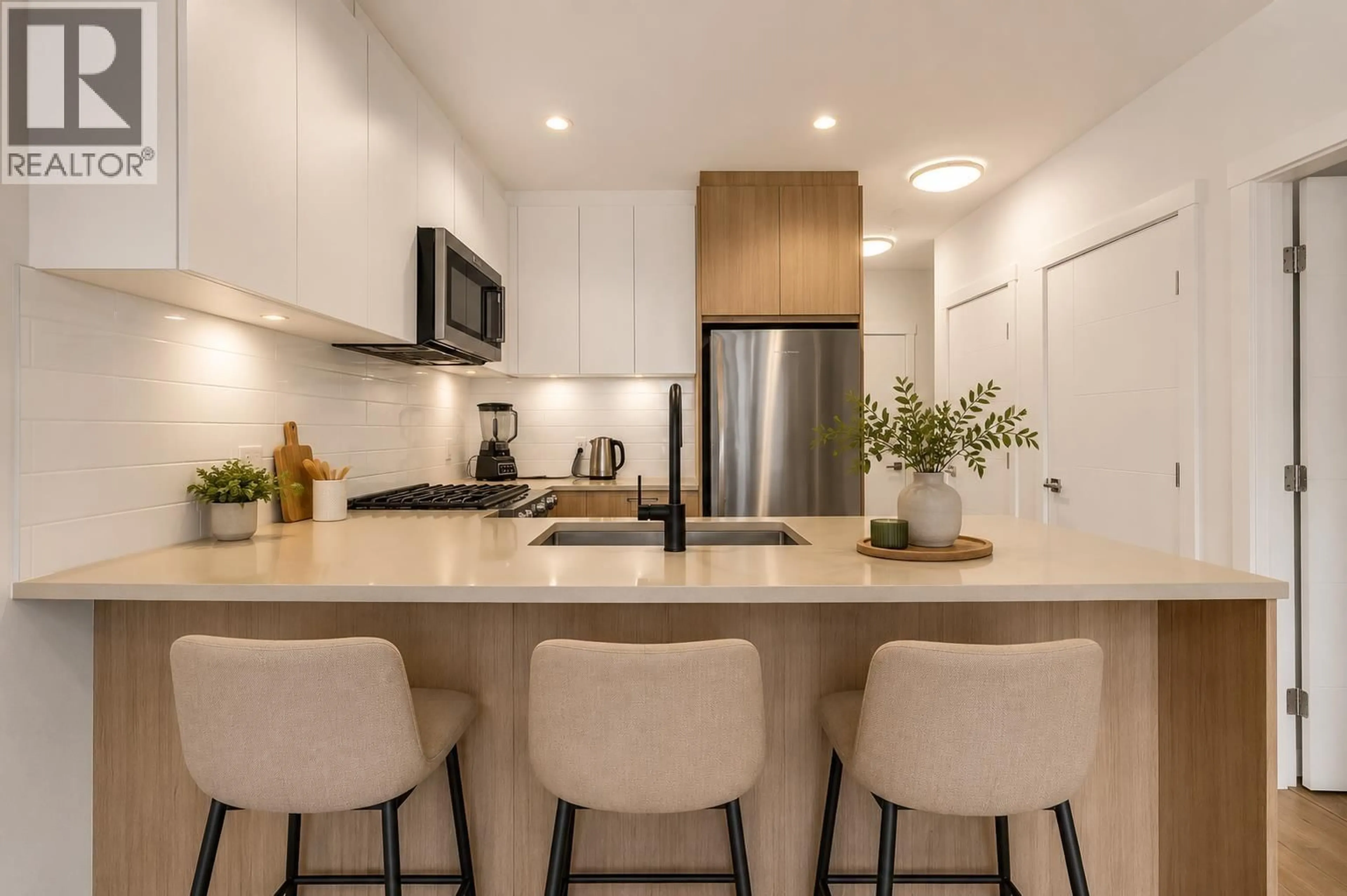Open concept kitchen, unknown for 212 - 707 COMO LAKE AVENUE, Coquitlam British Columbia V3J0J5