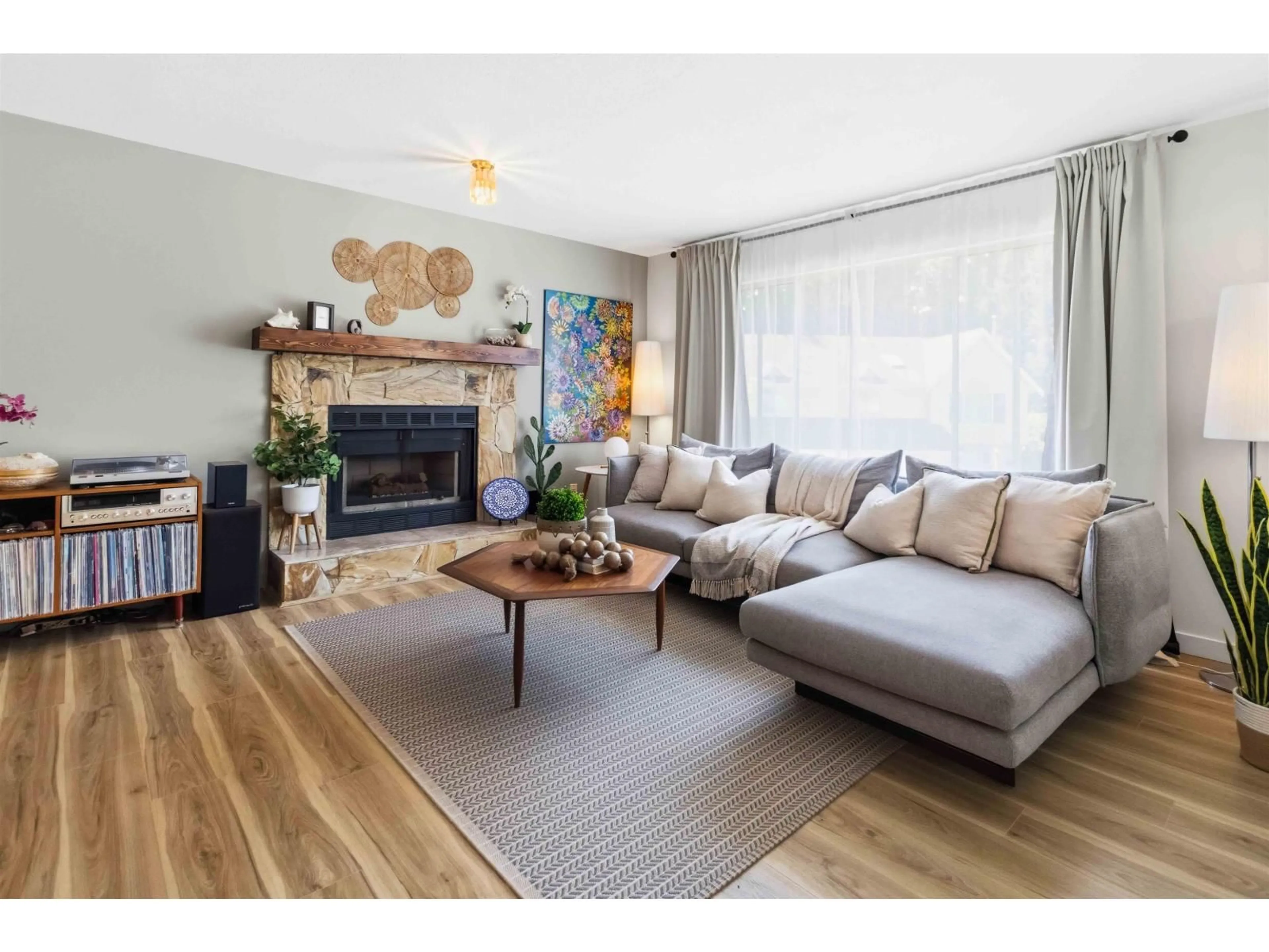 Living room with furniture, wood/laminate floor for 9030 JAMES PLACE, Delta British Columbia V4C2R8
