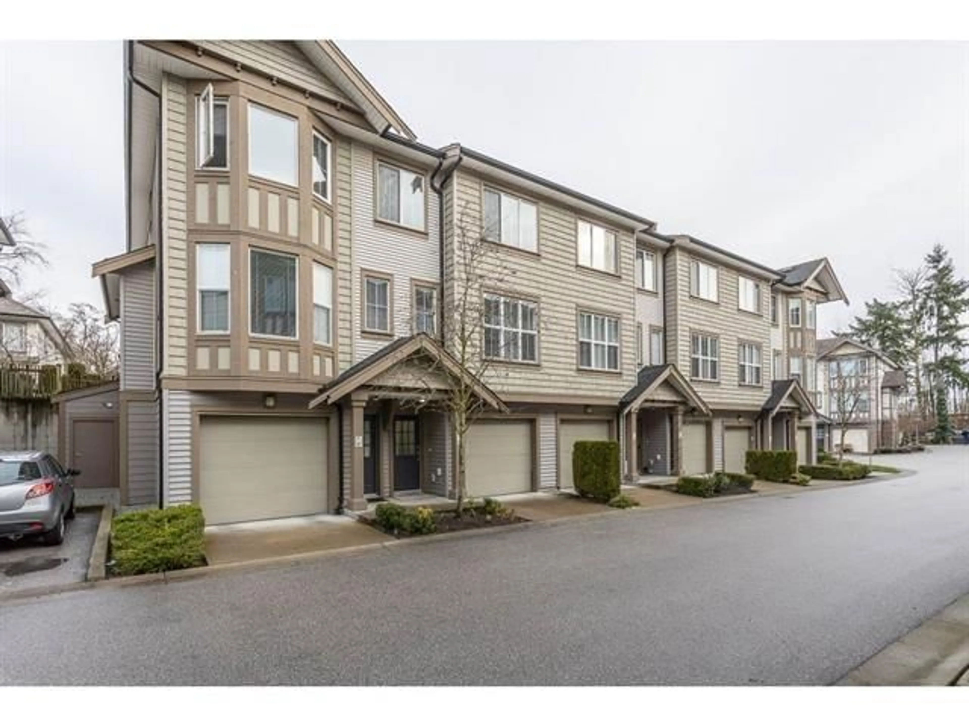 A pic from outside/outdoor area/front of a property/back of a property/a pic from drone, street for 46 - 14838 61 AVENUE, Surrey British Columbia V3S2P3