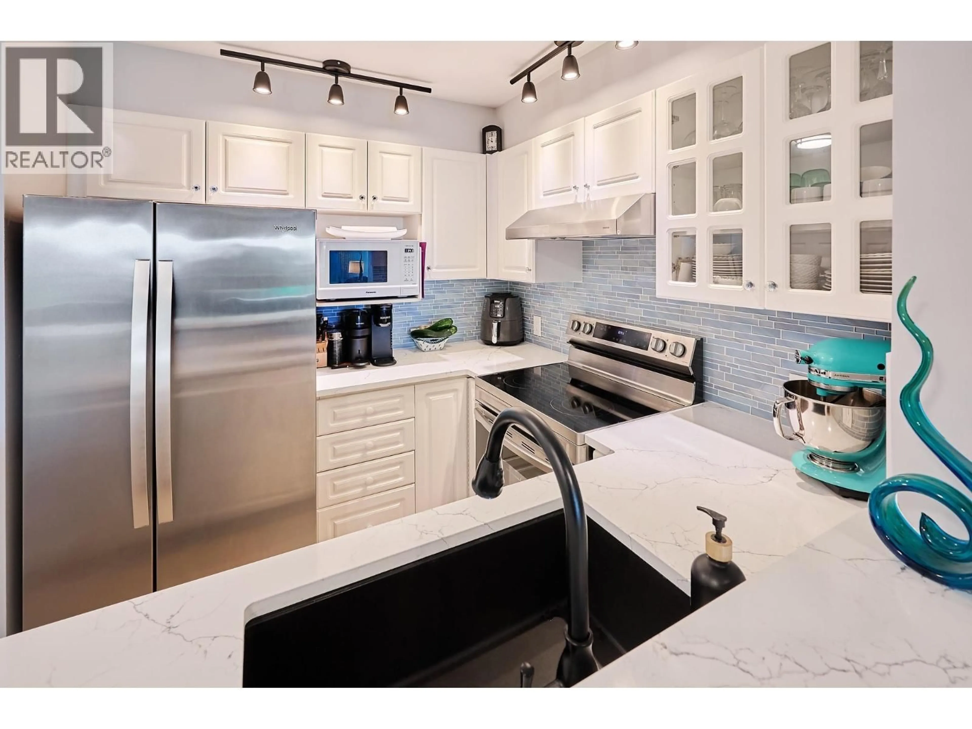 Contemporary kitchen, ceramic/tile floor for 305 - 155 3RD STREET, North Vancouver British Columbia V7L1E5