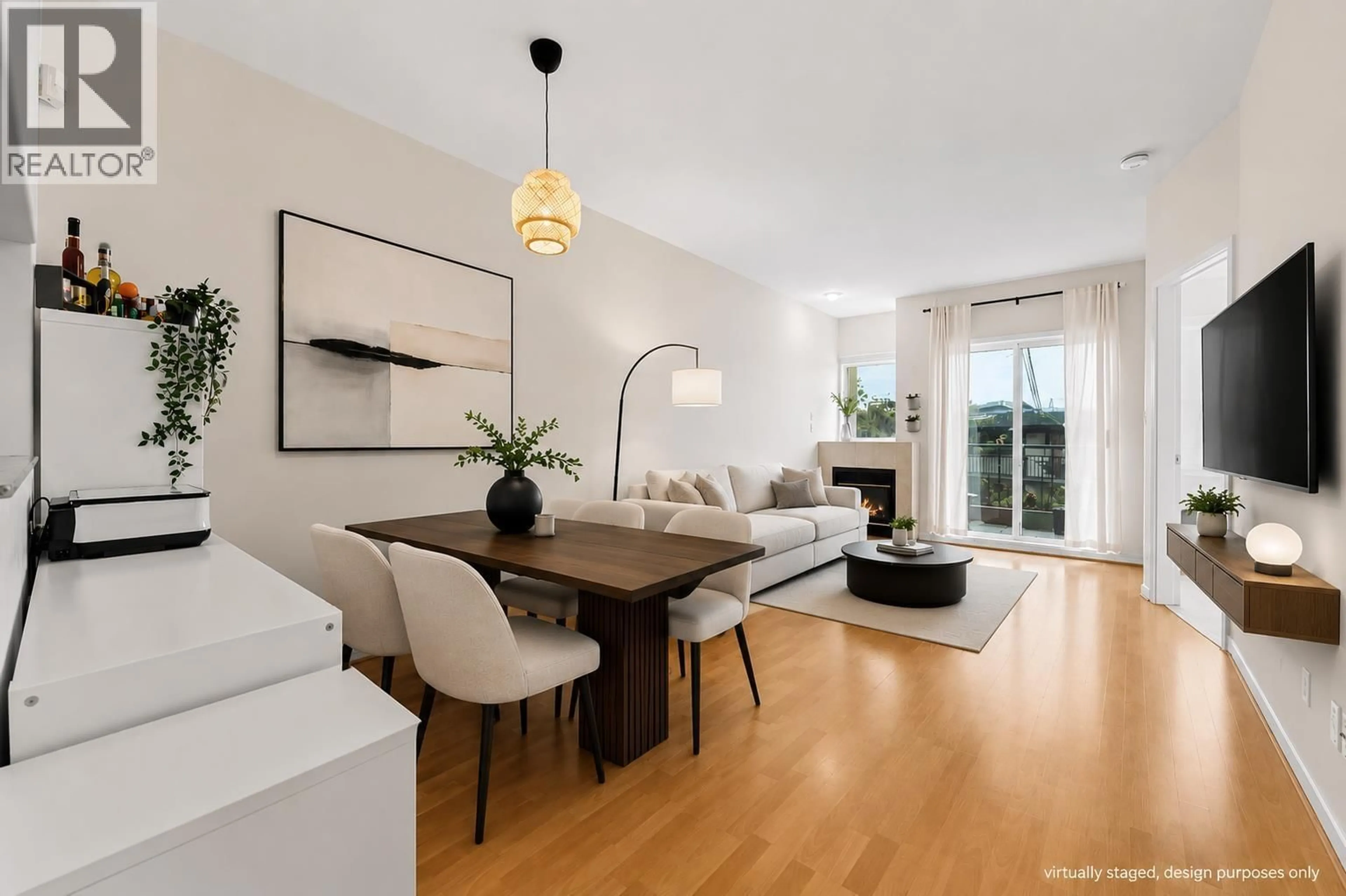 Living room with furniture, wood/laminate floor for 104 - 177 5TH STREET, North Vancouver British Columbia V7M1J6