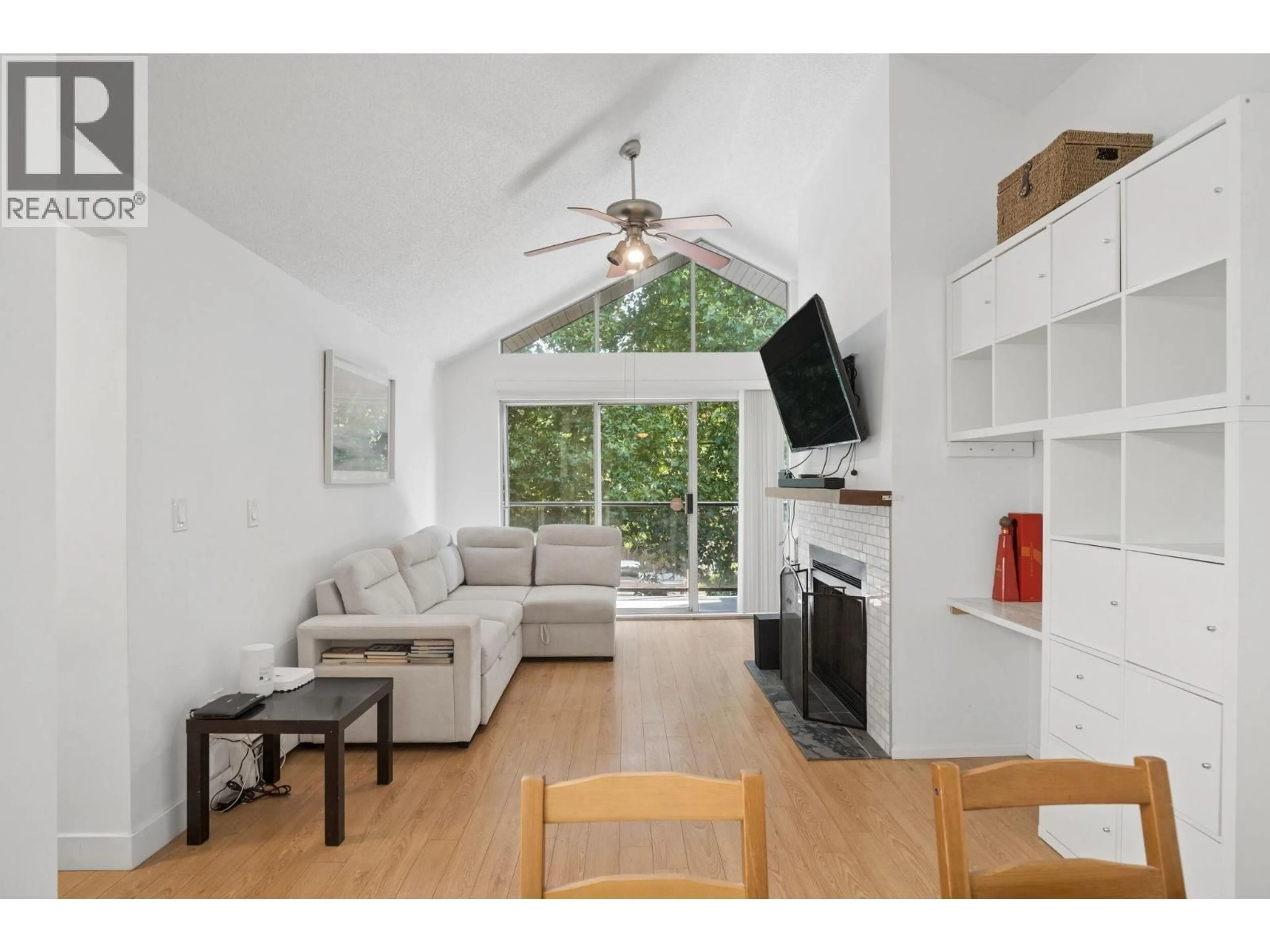 Living room with furniture, wood/laminate floor for 303 - 230 MOWAT STREET, New Westminster British Columbia V3M4B2