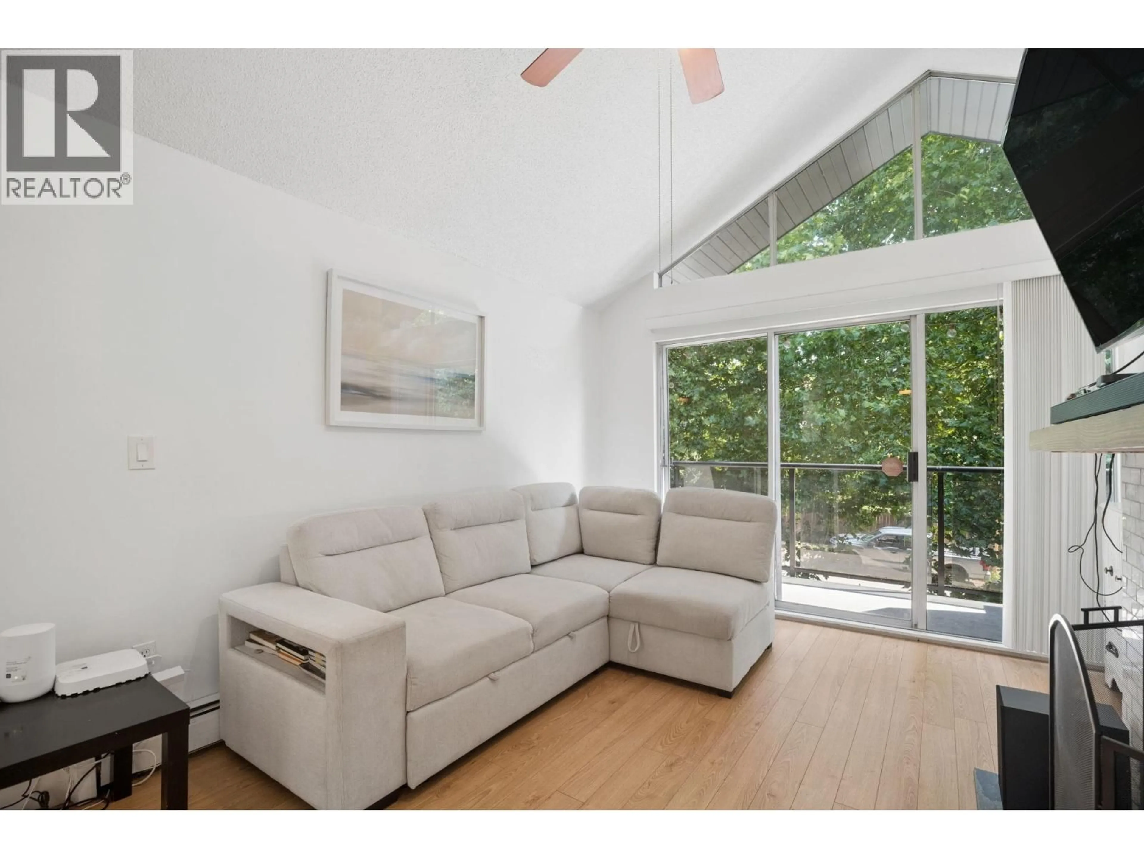 Living room with furniture, unknown for 303 - 230 MOWAT STREET, New Westminster British Columbia V3M4B2