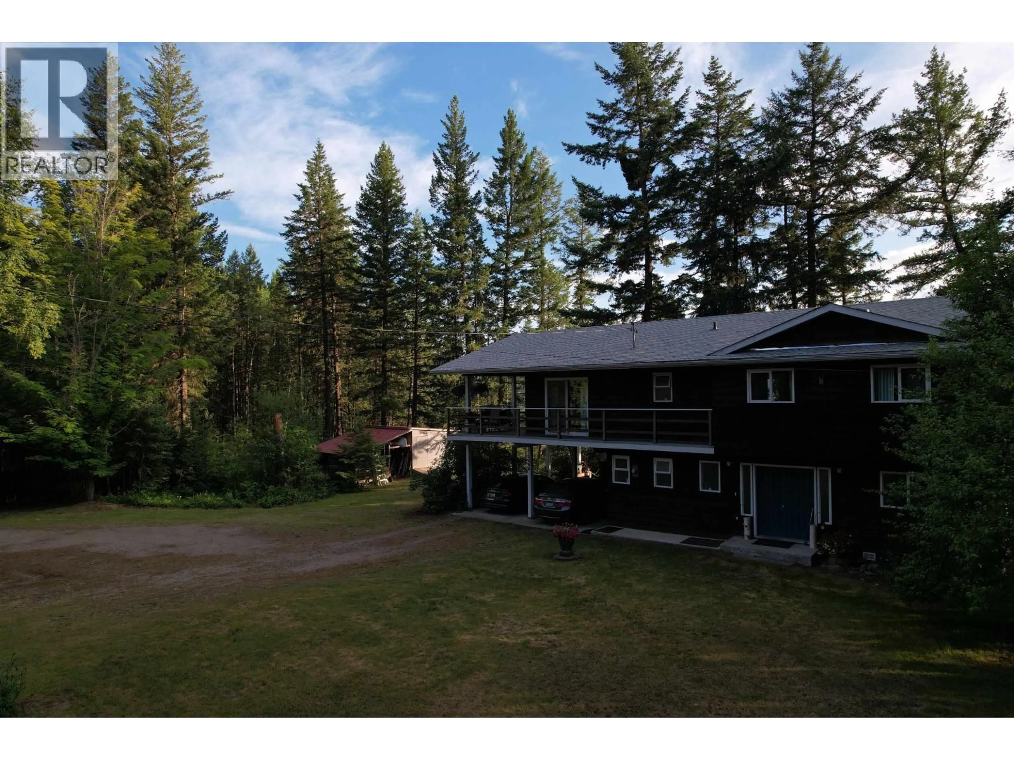 A pic from outside/outdoor area/front of a property/back of a property/a pic from drone, forest/trees view for 2400 ARNOLDUS ROAD, Quesnel British Columbia V2J6L2