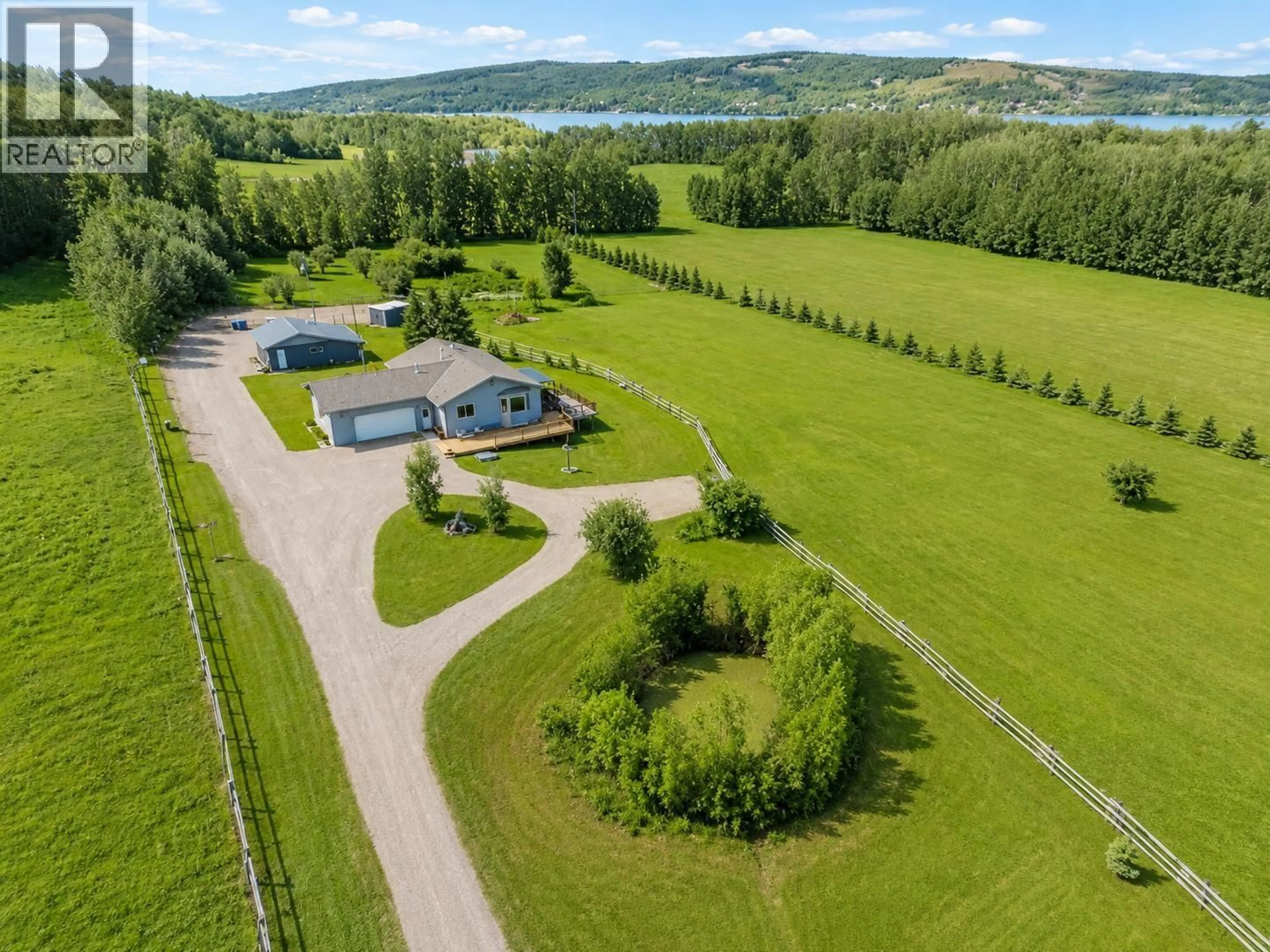 A pic from outside/outdoor area/front of a property/back of a property/a pic from drone, water/lake/river/ocean view for 12713 AITCHISON ROAD, Charlie Lake British Columbia V0C1H0