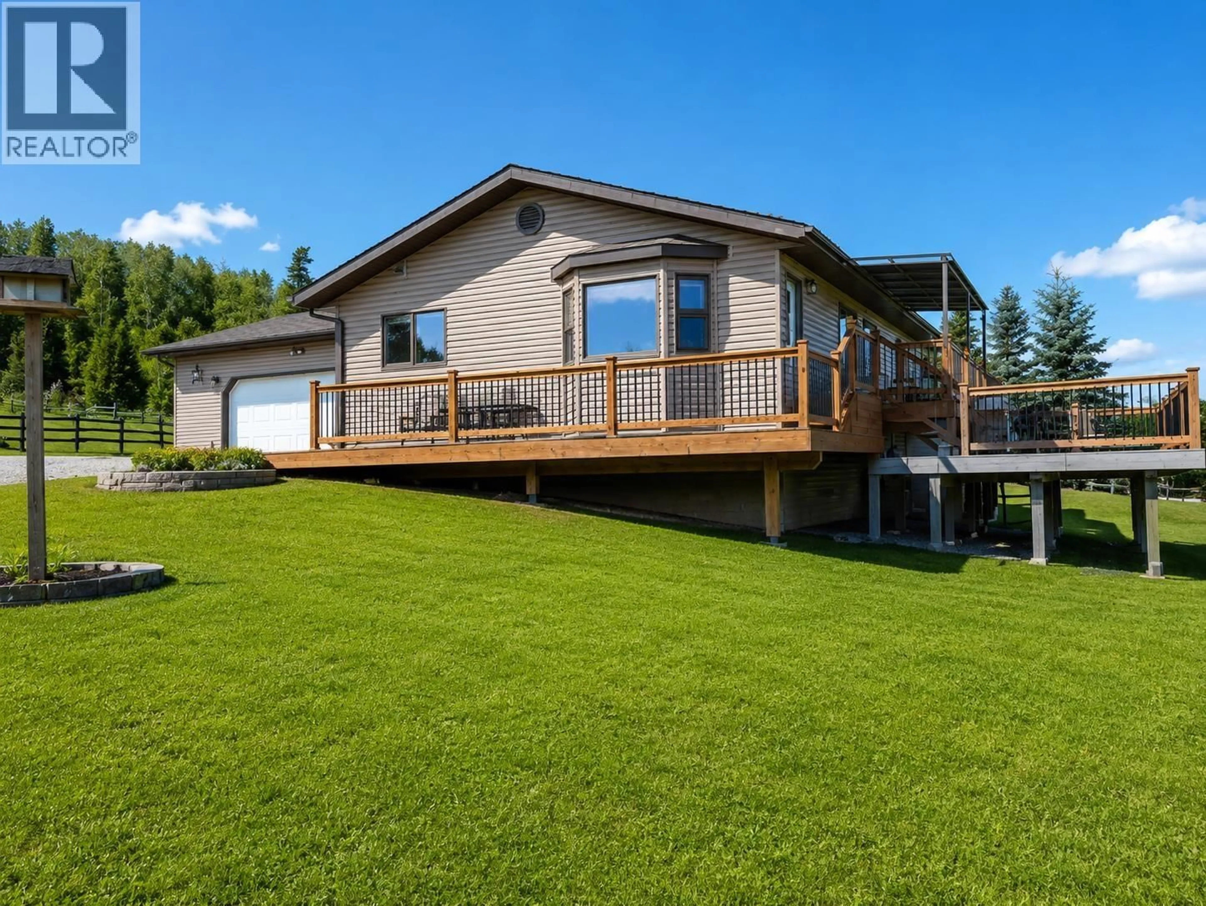 A pic from outside/outdoor area/front of a property/back of a property/a pic from drone, water/lake/river/ocean view for 12713 AITCHISON ROAD, Charlie Lake British Columbia V0C1H0