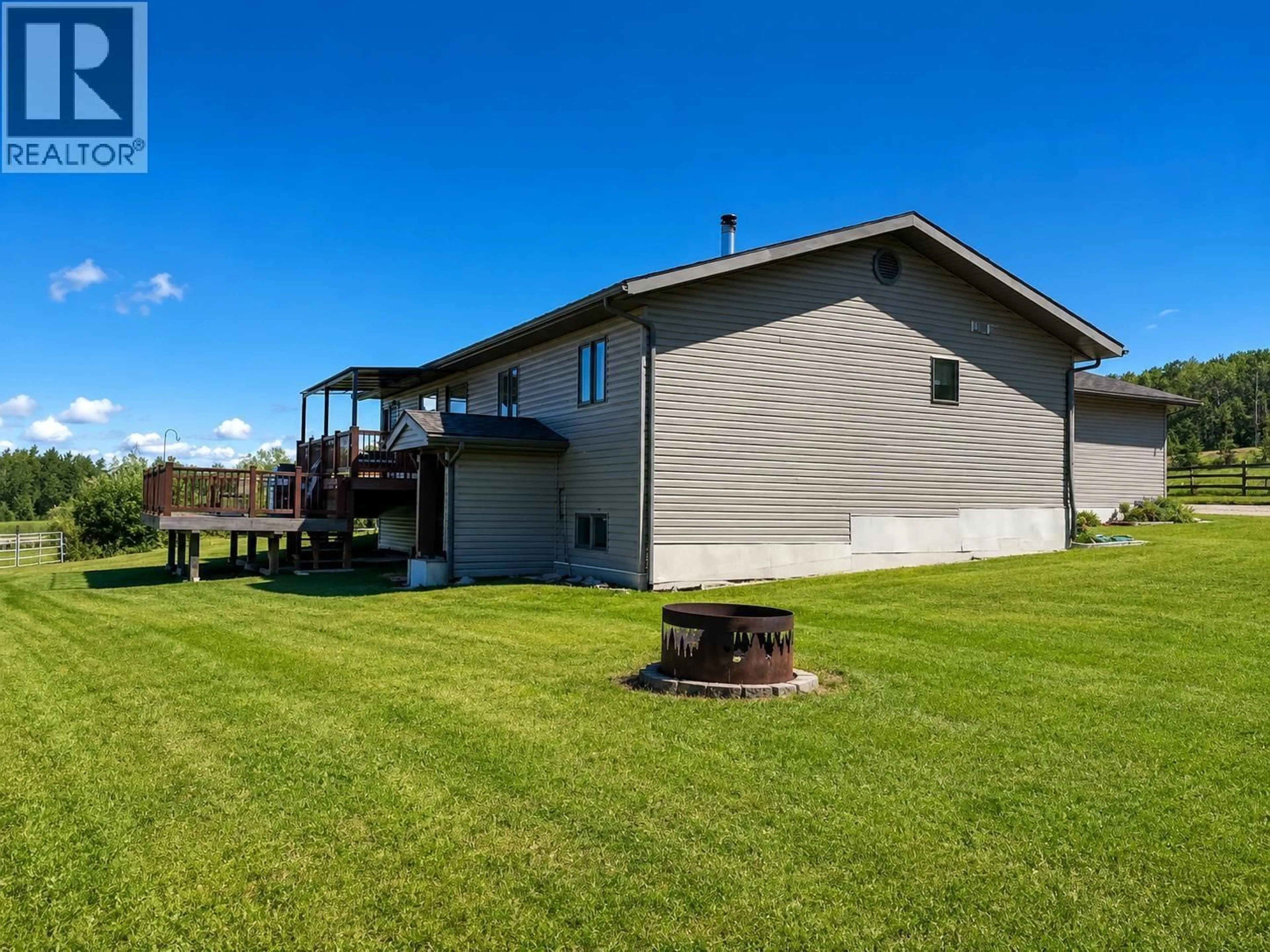 A pic from outside/outdoor area/front of a property/back of a property/a pic from drone, water/lake/river/ocean view for 12713 AITCHISON ROAD, Charlie Lake British Columbia V0C1H0