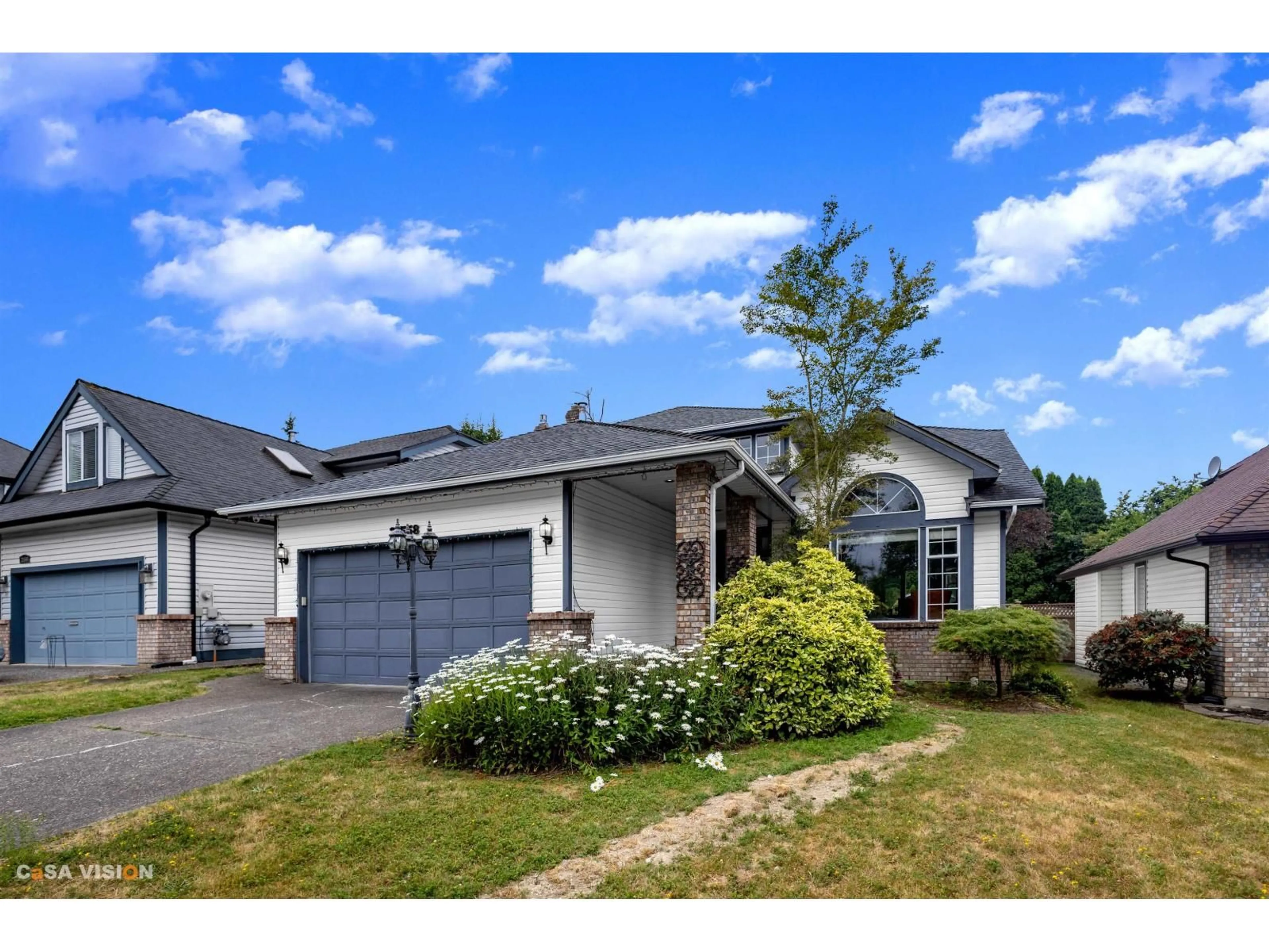 Home with vinyl exterior material, street for 21558 86A CRESCENT, Langley British Columbia V1M2E3