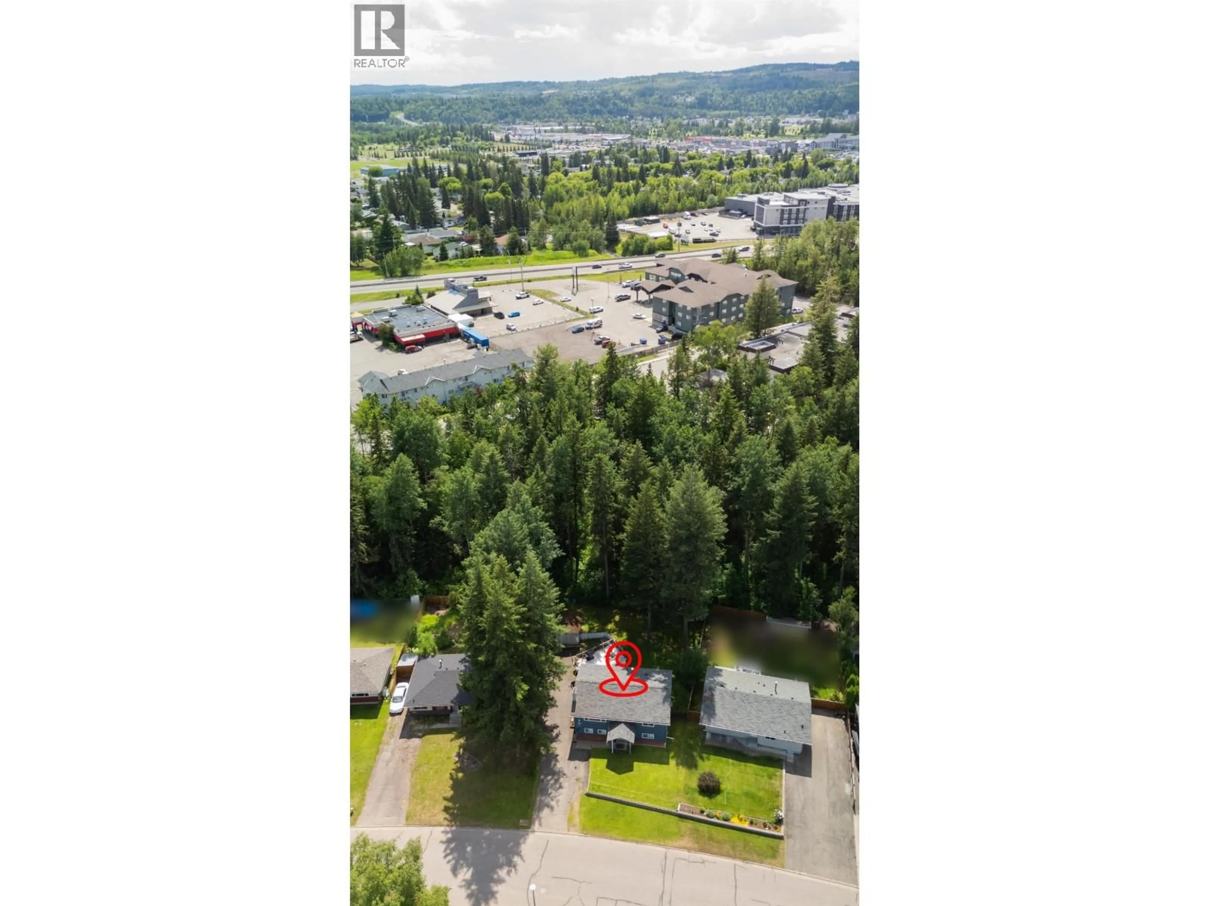 A pic from outside/outdoor area/front of a property/back of a property/a pic from drone, water/lake/river/ocean view for 1601 PEARSON AVENUE, Prince George British Columbia V2L4K7