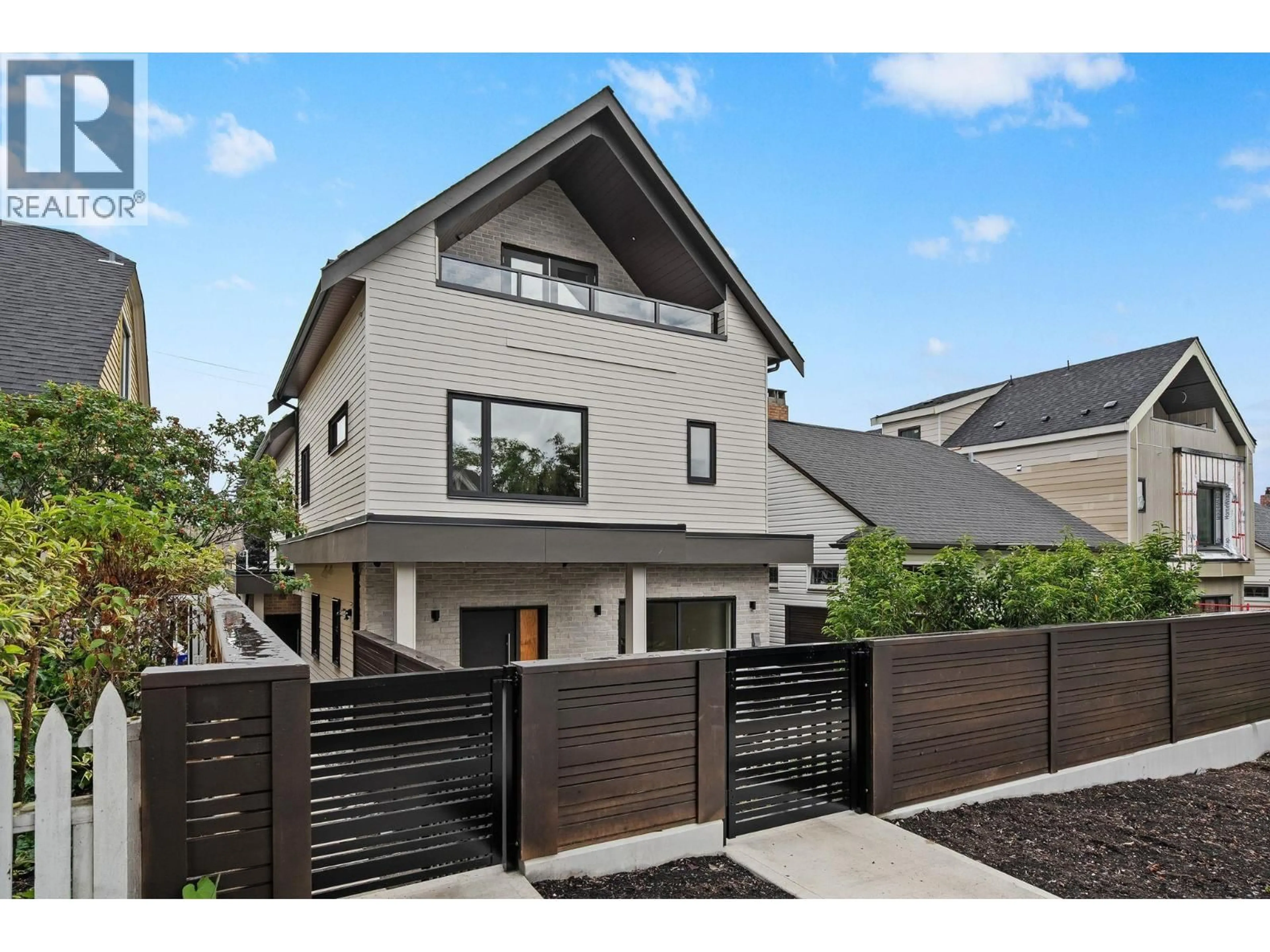 Home with brick exterior material, street for 2 - 2211 WILLIAM STREET, Vancouver British Columbia V5L2S5