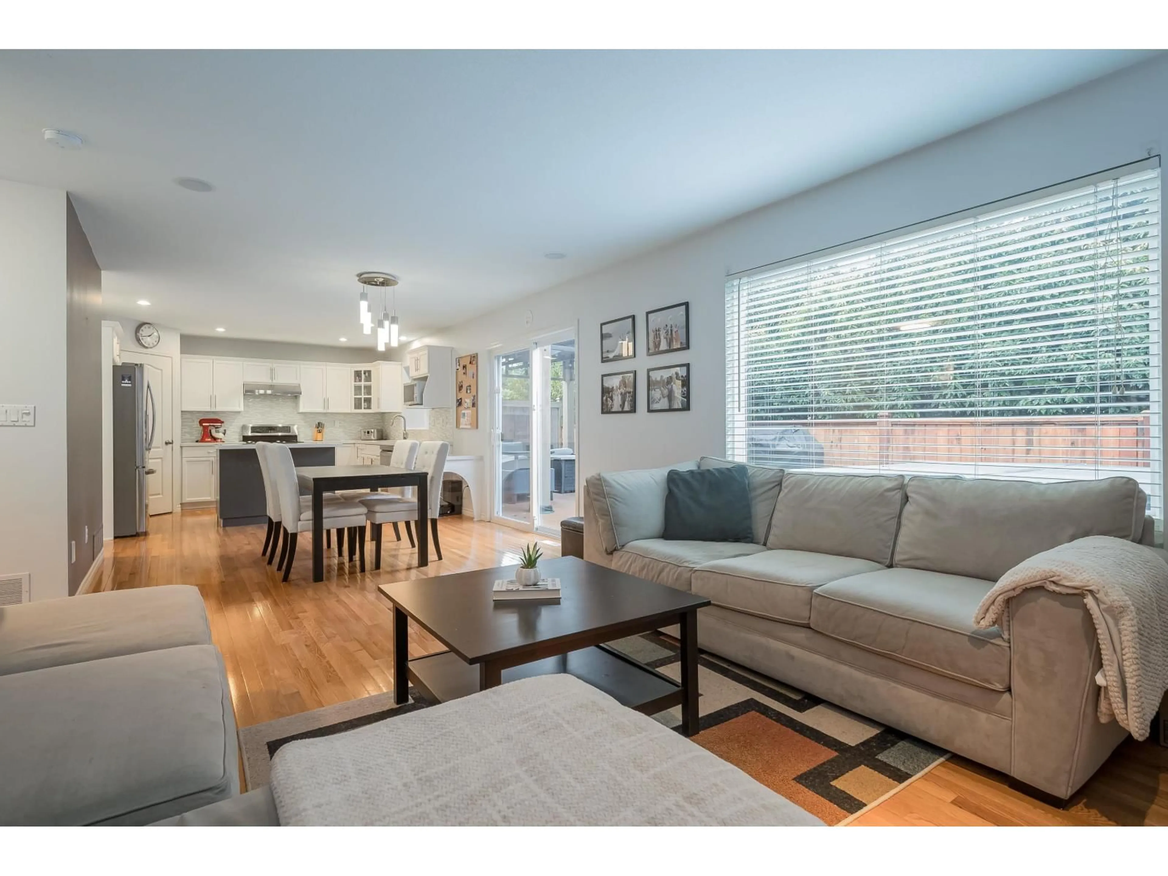 Living room with furniture, wood/laminate floor for 20265 94B AVENUE, Langley British Columbia V1M3Z4