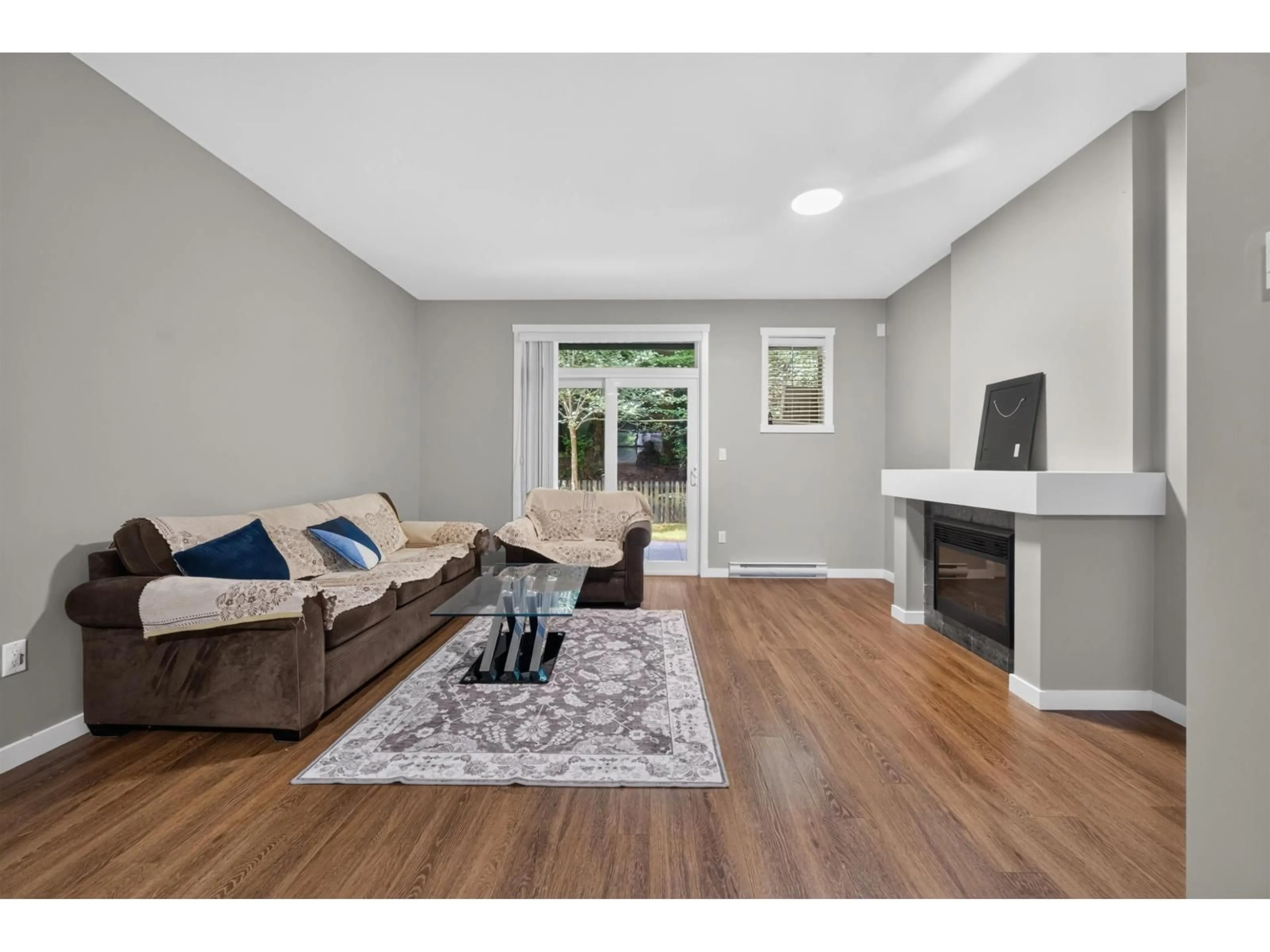 Living room with furniture, wood/laminate floor for 45 - 6123 138 STREET, Surrey British Columbia V3X1E8