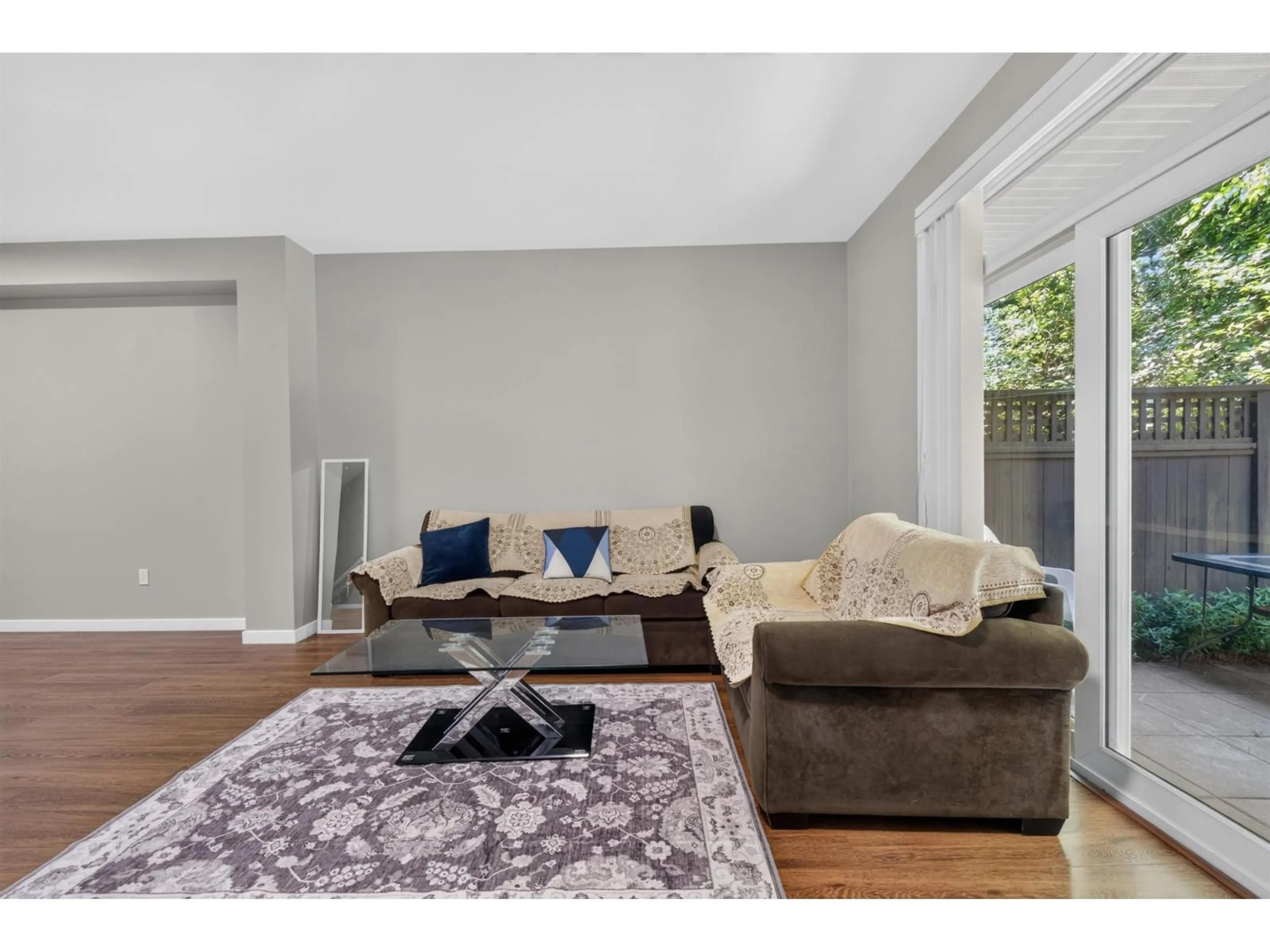 Living room with furniture, wood/laminate floor for 45 - 6123 138 STREET, Surrey British Columbia V3X1E8