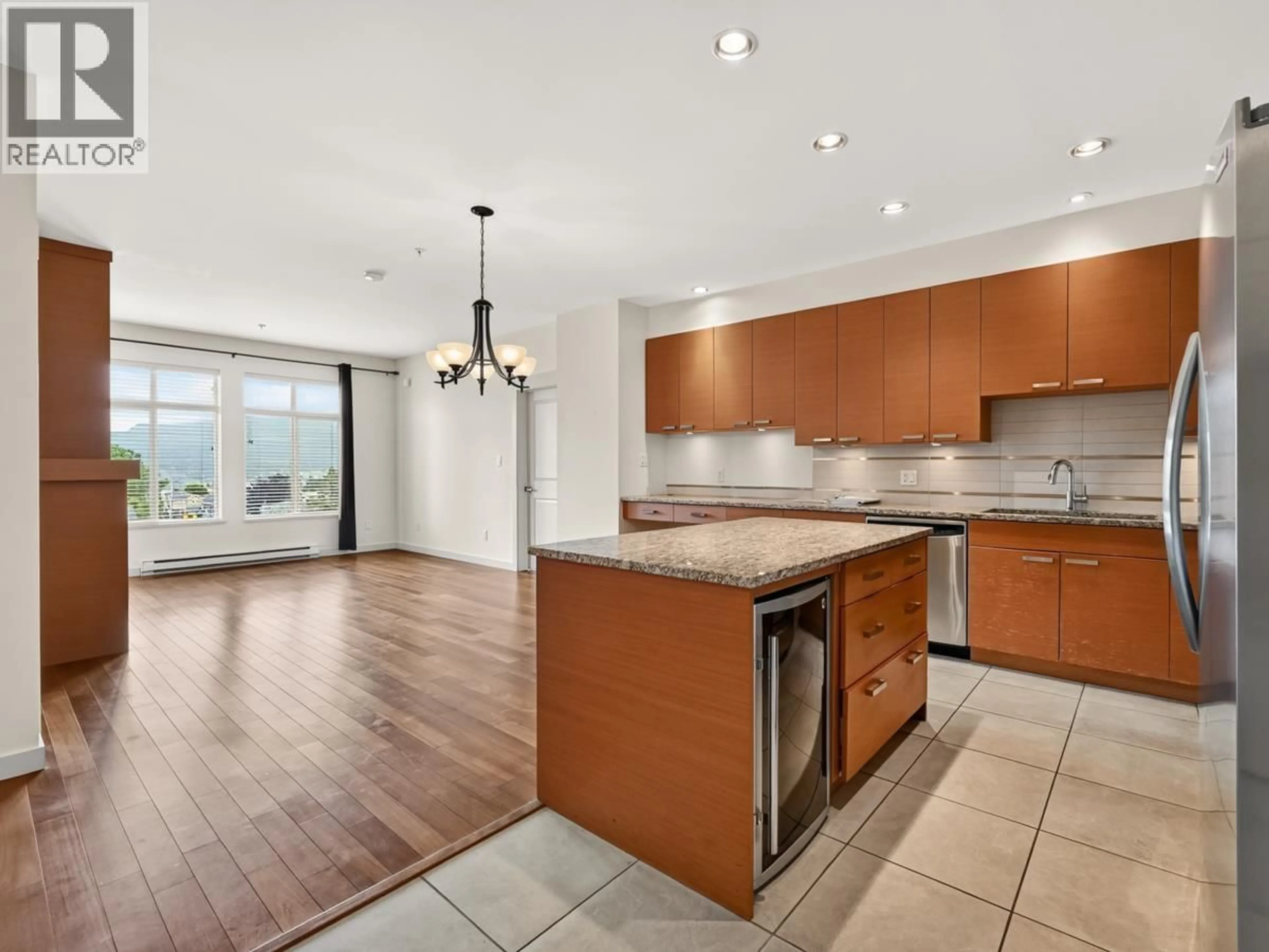 Open concept kitchen, unknown for 305 - 4365 HASTINGS STREET, Burnaby British Columbia V5C0B7