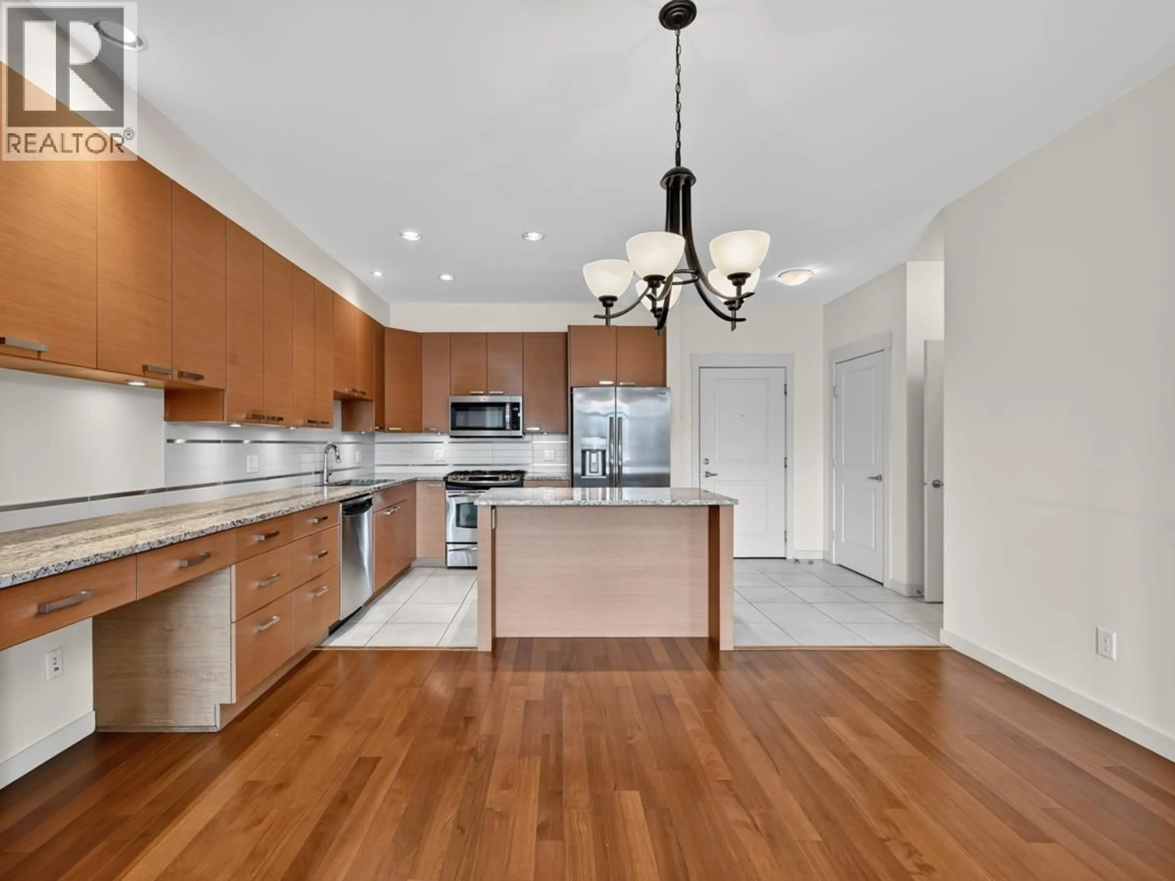 Open concept kitchen, unknown for 305 - 4365 HASTINGS STREET, Burnaby British Columbia V5C0B7