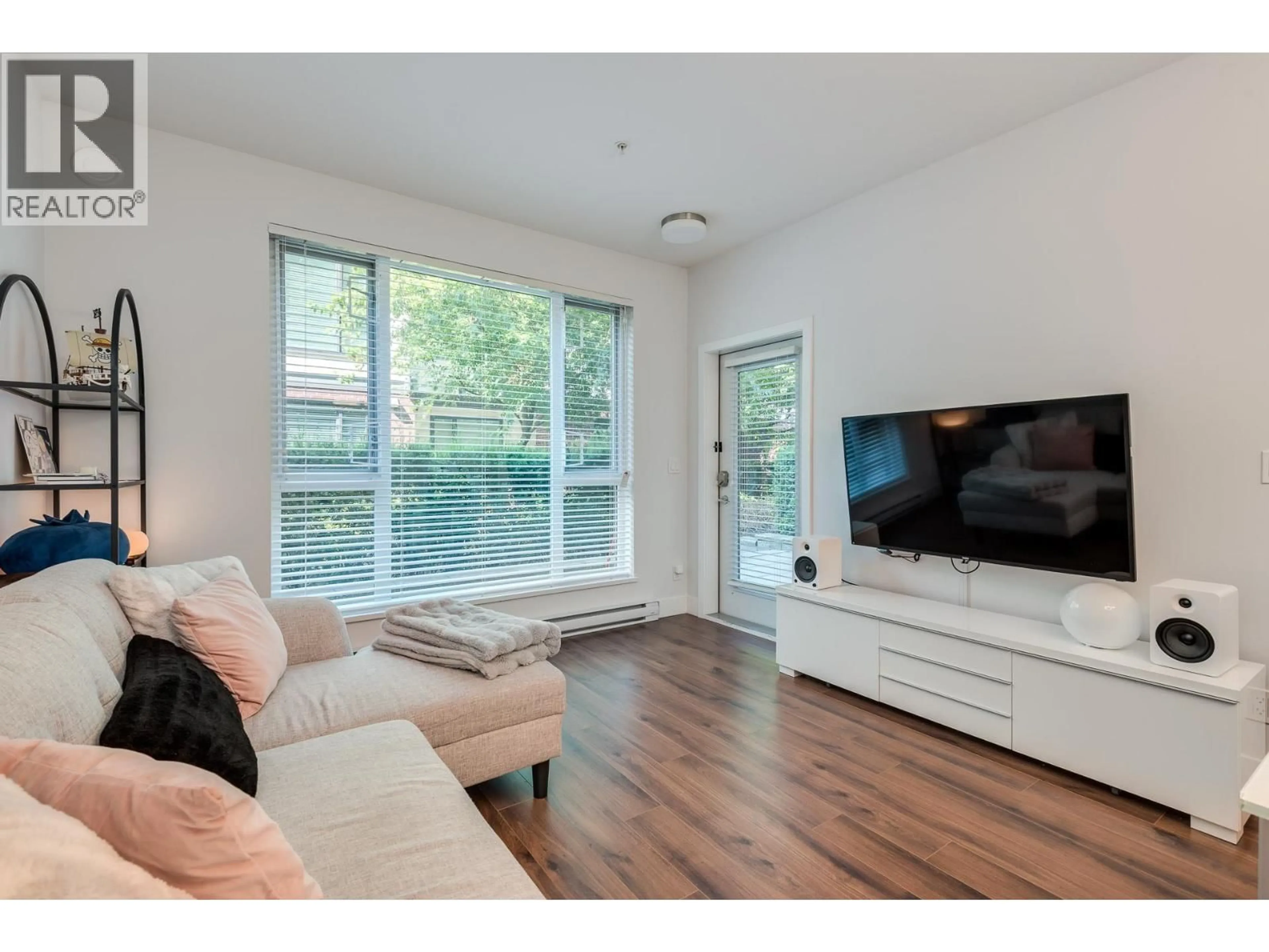 Living room with furniture, wood/laminate floor for 123 - 5355 LANE STREET, Burnaby British Columbia V5H0H1