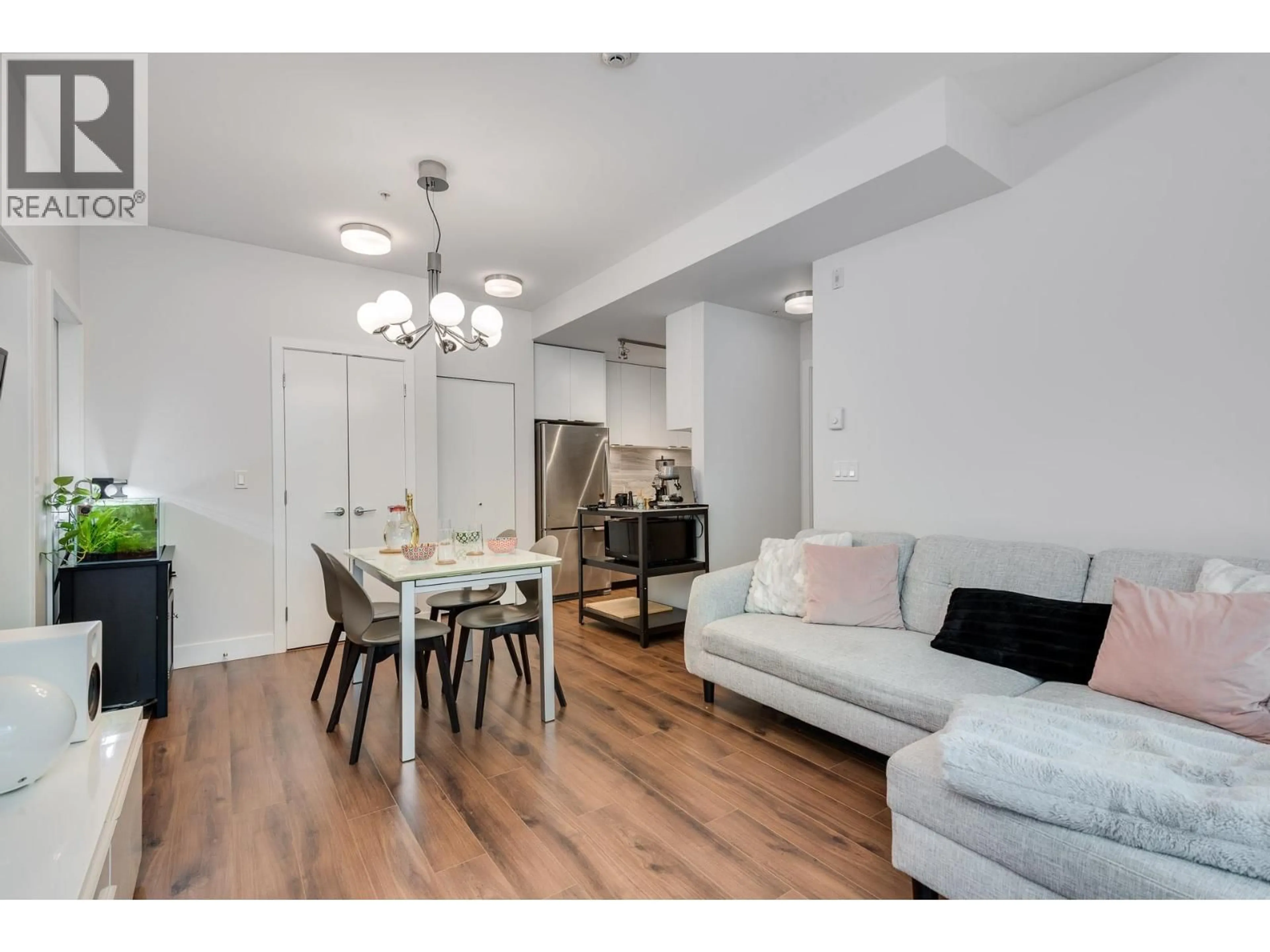 Living room with furniture, wood/laminate floor for 123 - 5355 LANE STREET, Burnaby British Columbia V5H0H1