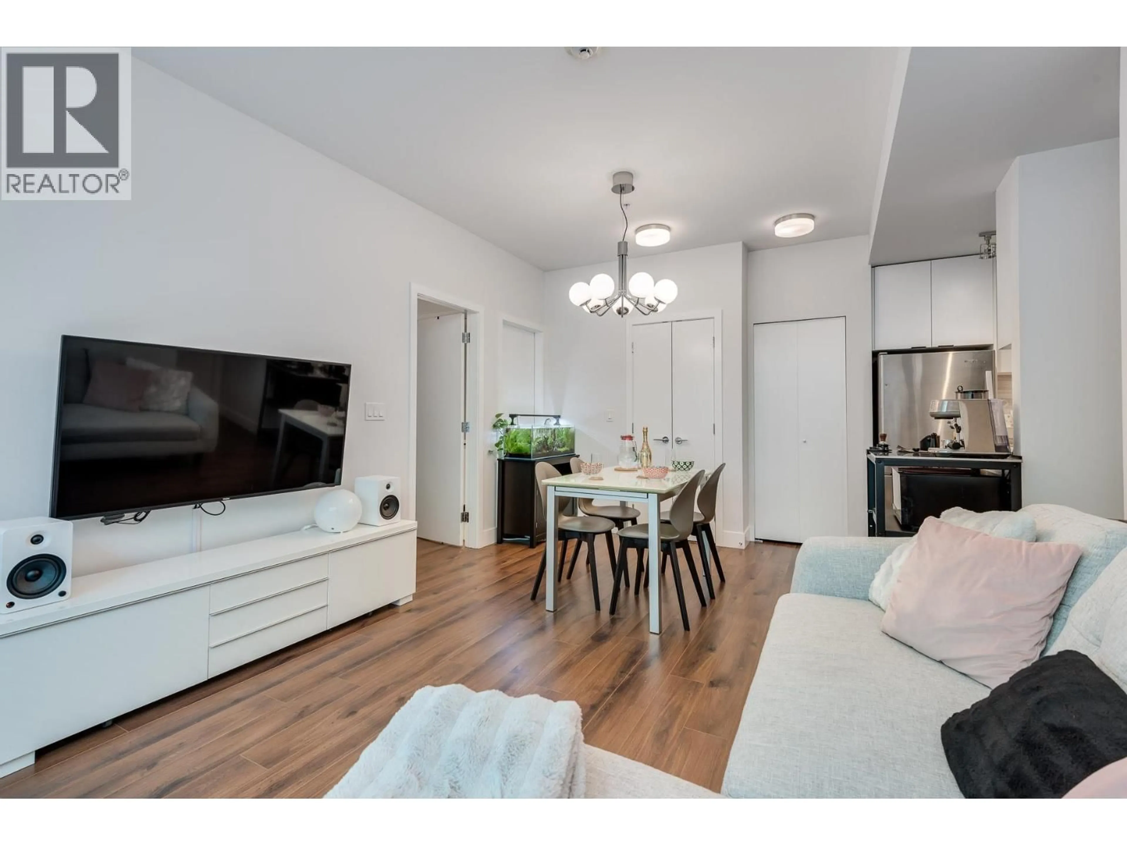 Living room with furniture, wood/laminate floor for 123 - 5355 LANE STREET, Burnaby British Columbia V5H0H1