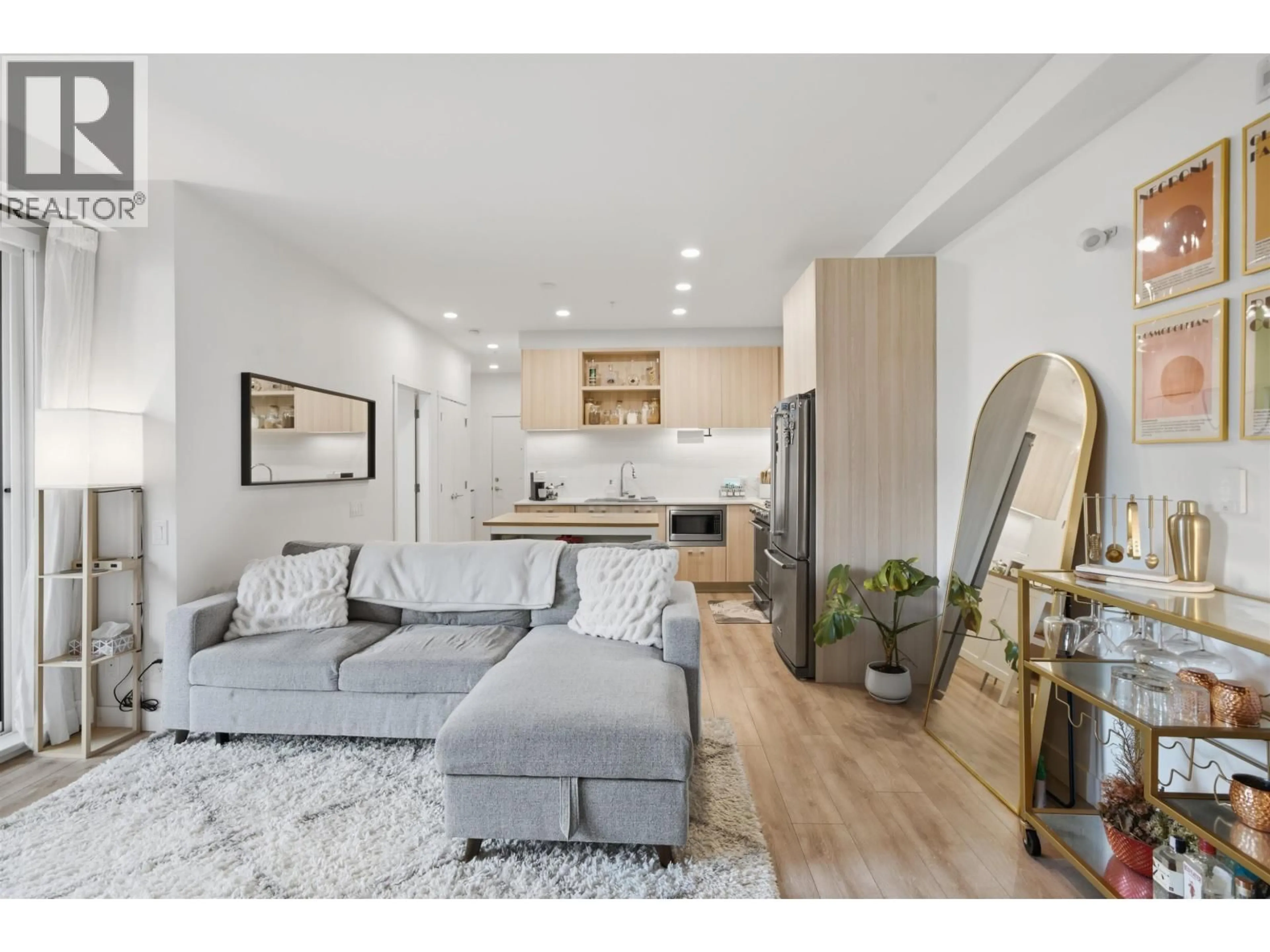 Living room with furniture, wood/laminate floor for 324 - 735 ANSKAR COURT, Coquitlam British Columbia V3J0L7