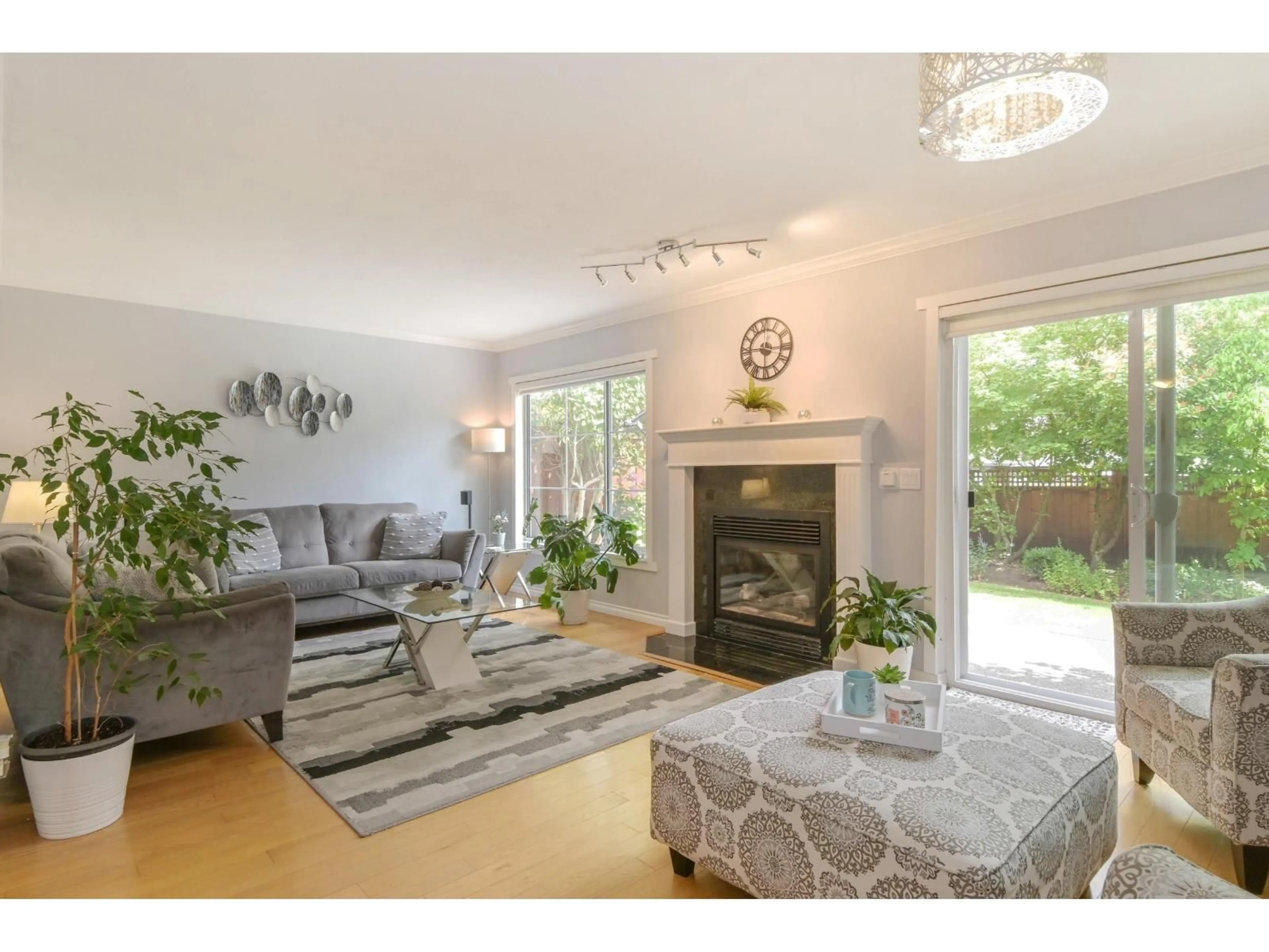 Living room with furniture, wood/laminate floor for 41 - 16016 82 AVENUE, Surrey British Columbia V4N0N7