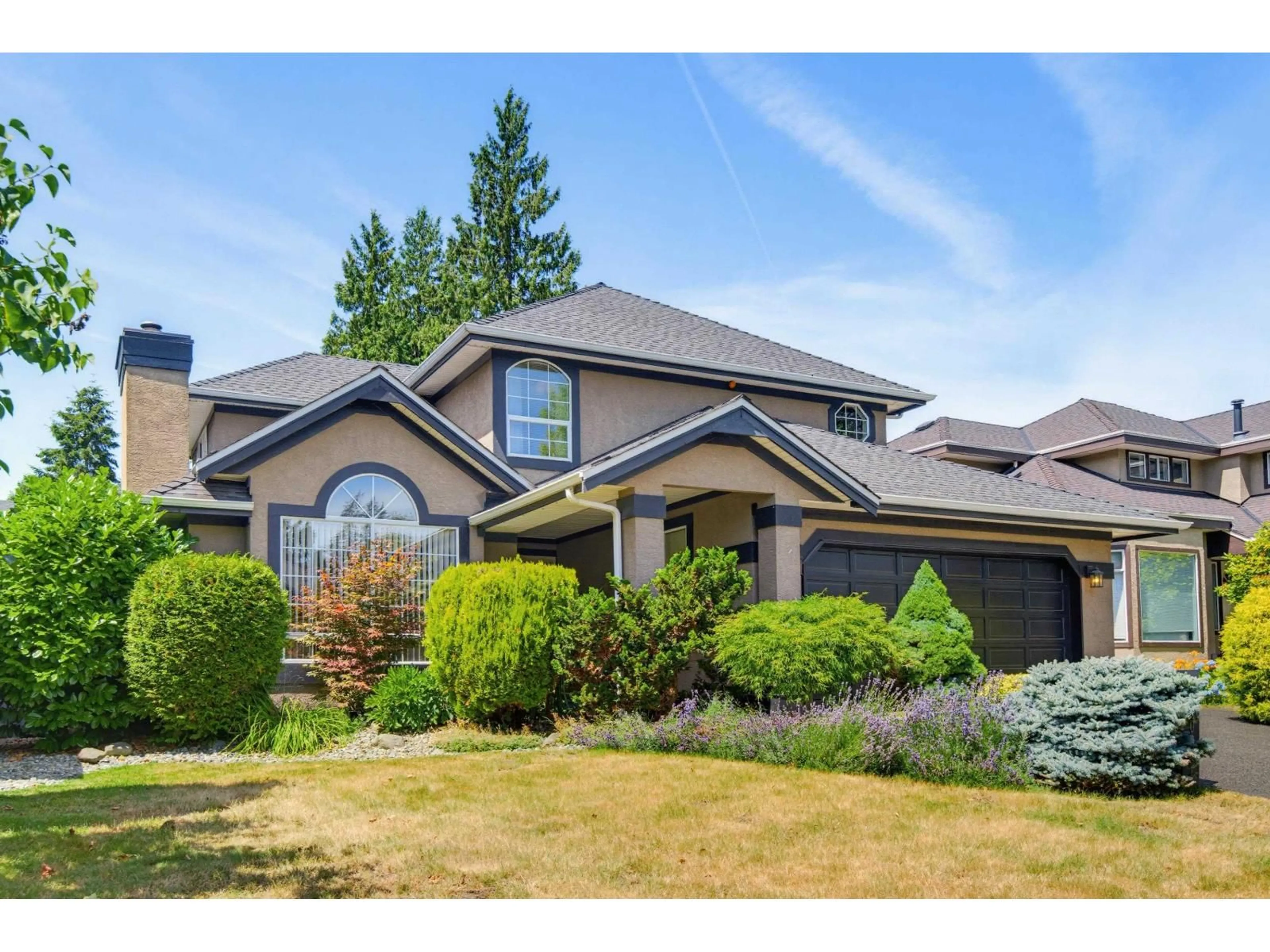 Home with vinyl exterior material, street for 10931 161A STREET, Surrey British Columbia V4N3J7