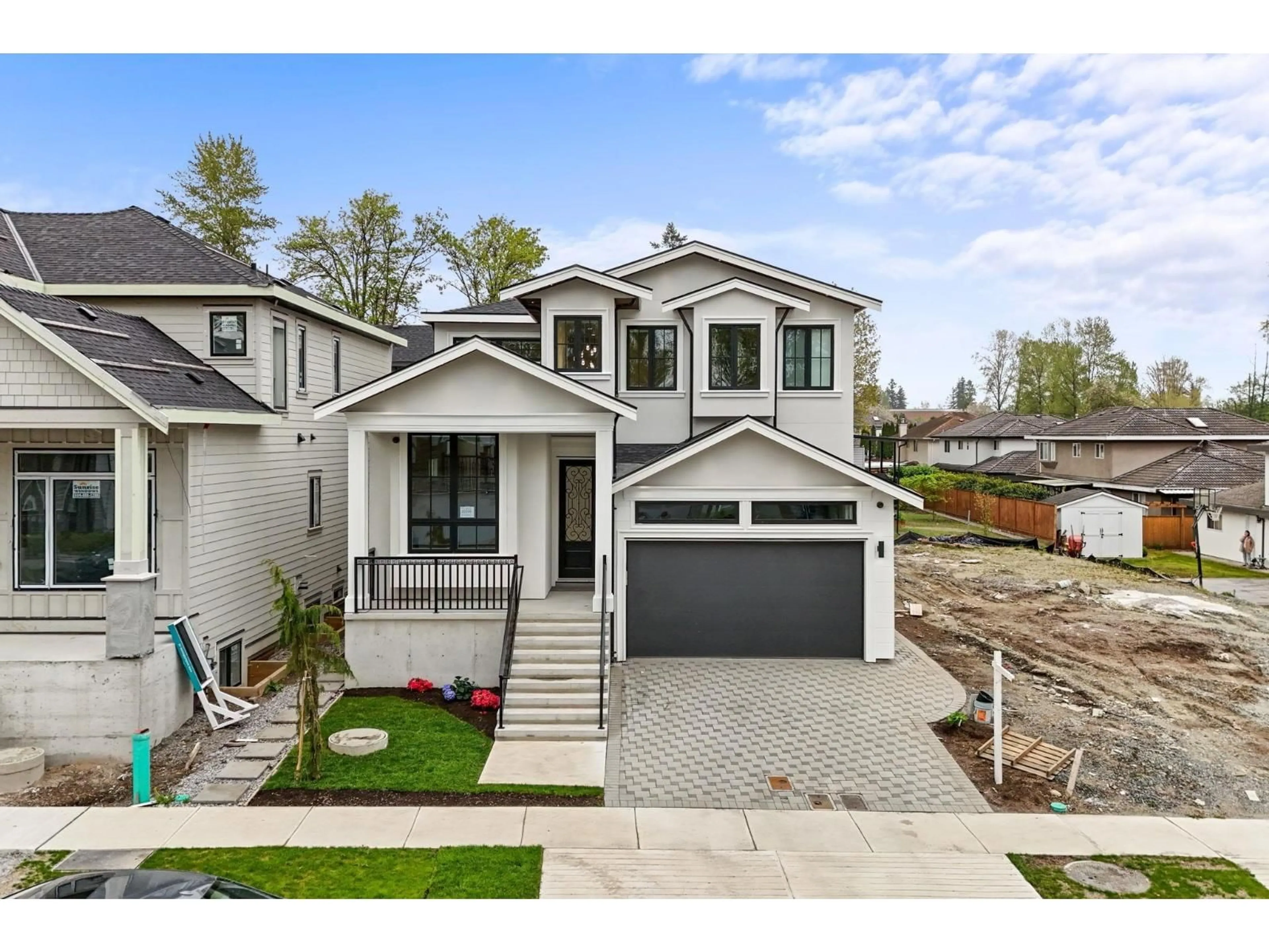 Home with vinyl exterior material, street for 10266 166A STREET, Surrey British Columbia V4N1Y7