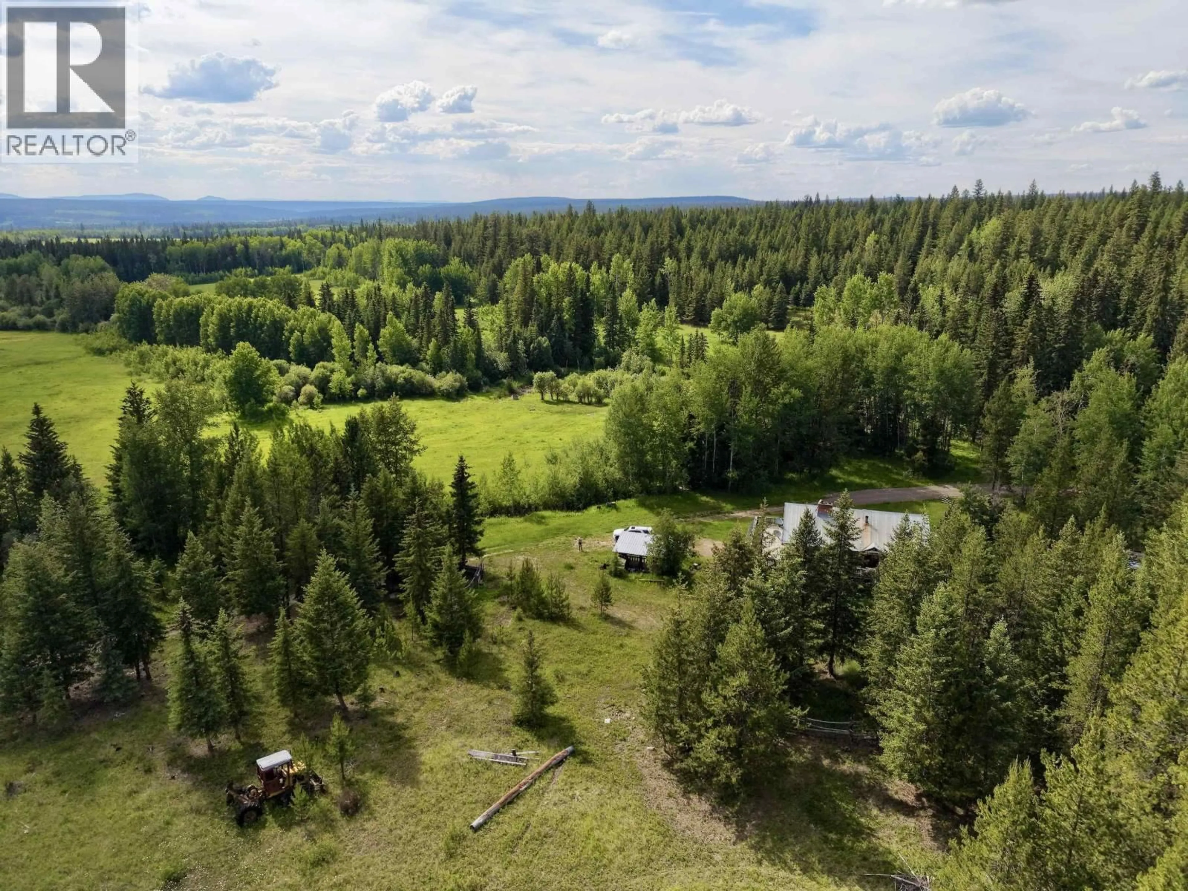 A pic from outside/outdoor area/front of a property/back of a property/a pic from drone, forest/trees view for 4120 KNIFE CREEK ROAD, 150 Mile House British Columbia V0K2G0
