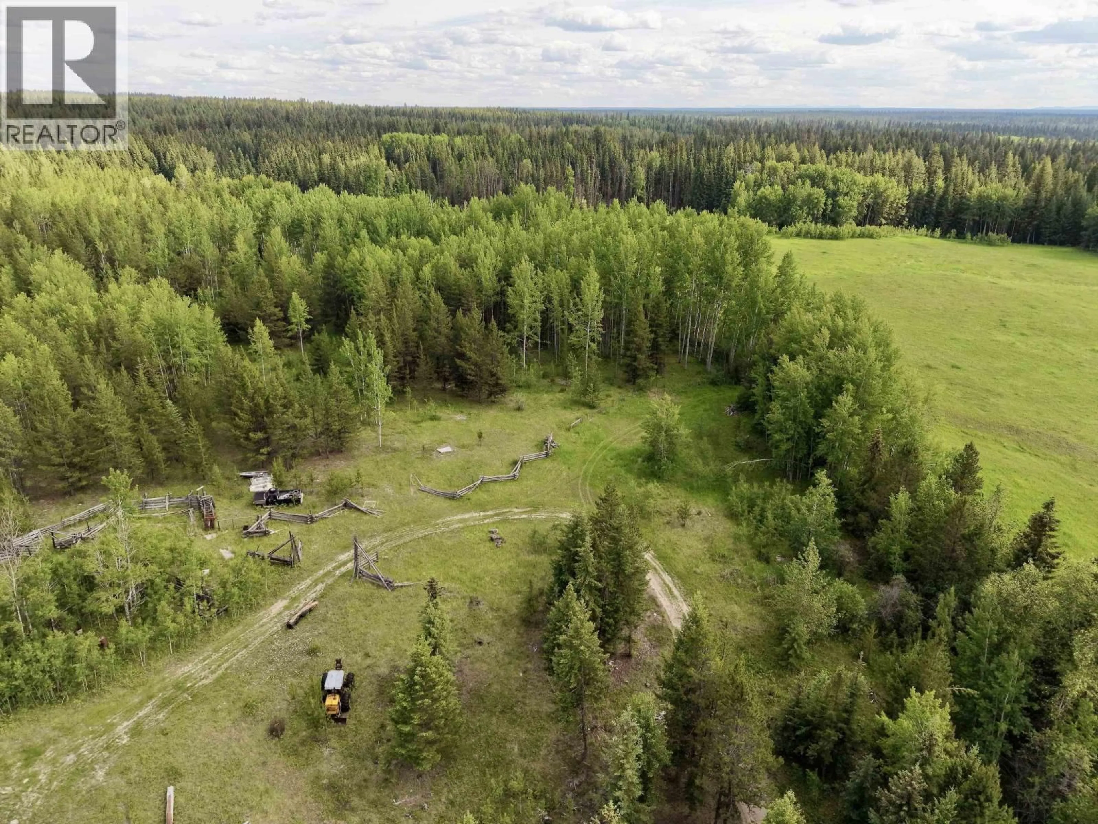 A pic from outside/outdoor area/front of a property/back of a property/a pic from drone, forest/trees view for 4120 KNIFE CREEK ROAD, 150 Mile House British Columbia V0K2G0