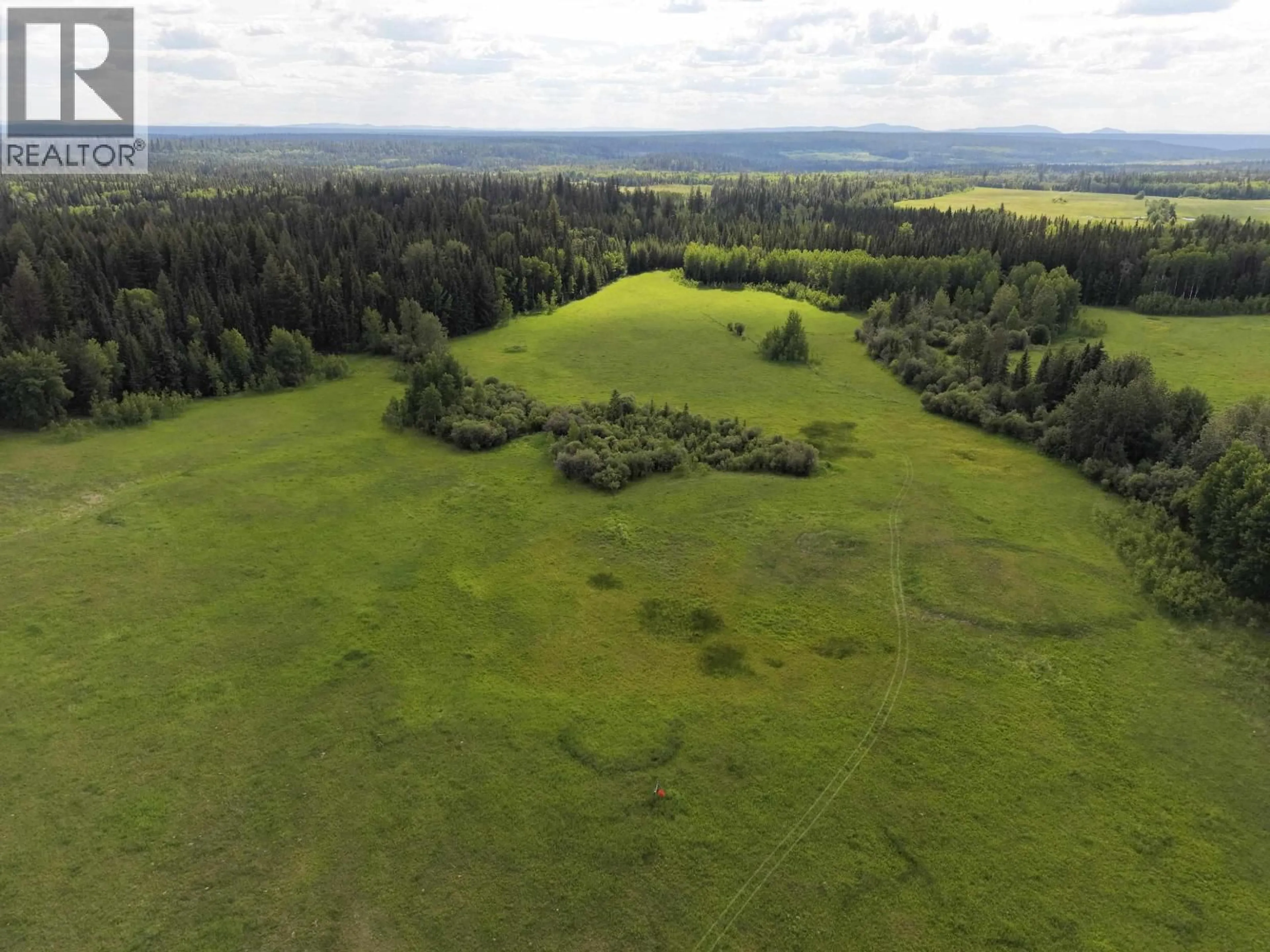 A pic from outside/outdoor area/front of a property/back of a property/a pic from drone, forest/trees view for 4120 KNIFE CREEK ROAD, 150 Mile House British Columbia V0K2G0