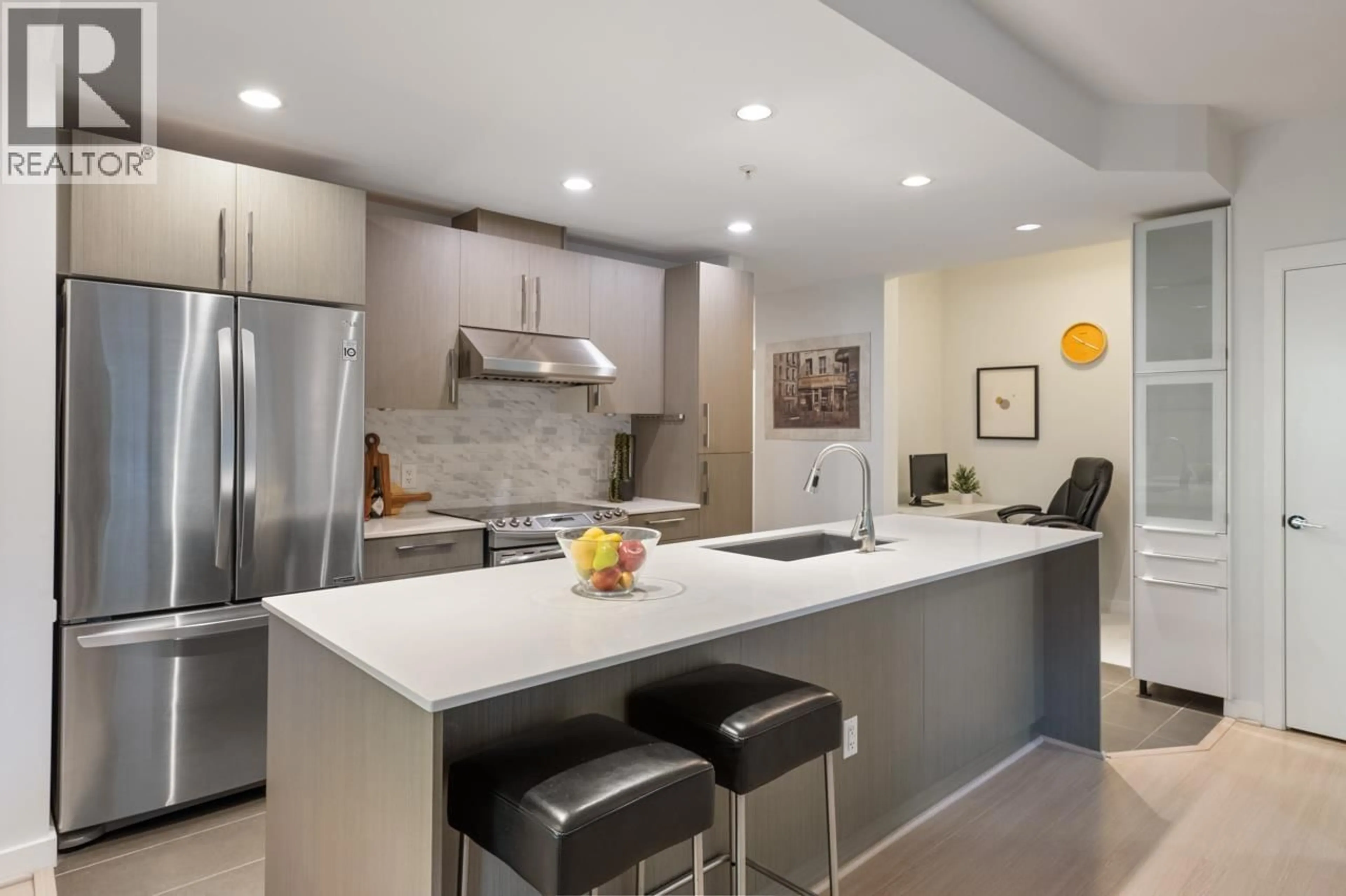 Open concept kitchen, ceramic/tile floor for 105 - 3479 WESBROOK MALL, Vancouver British Columbia V6S0B7