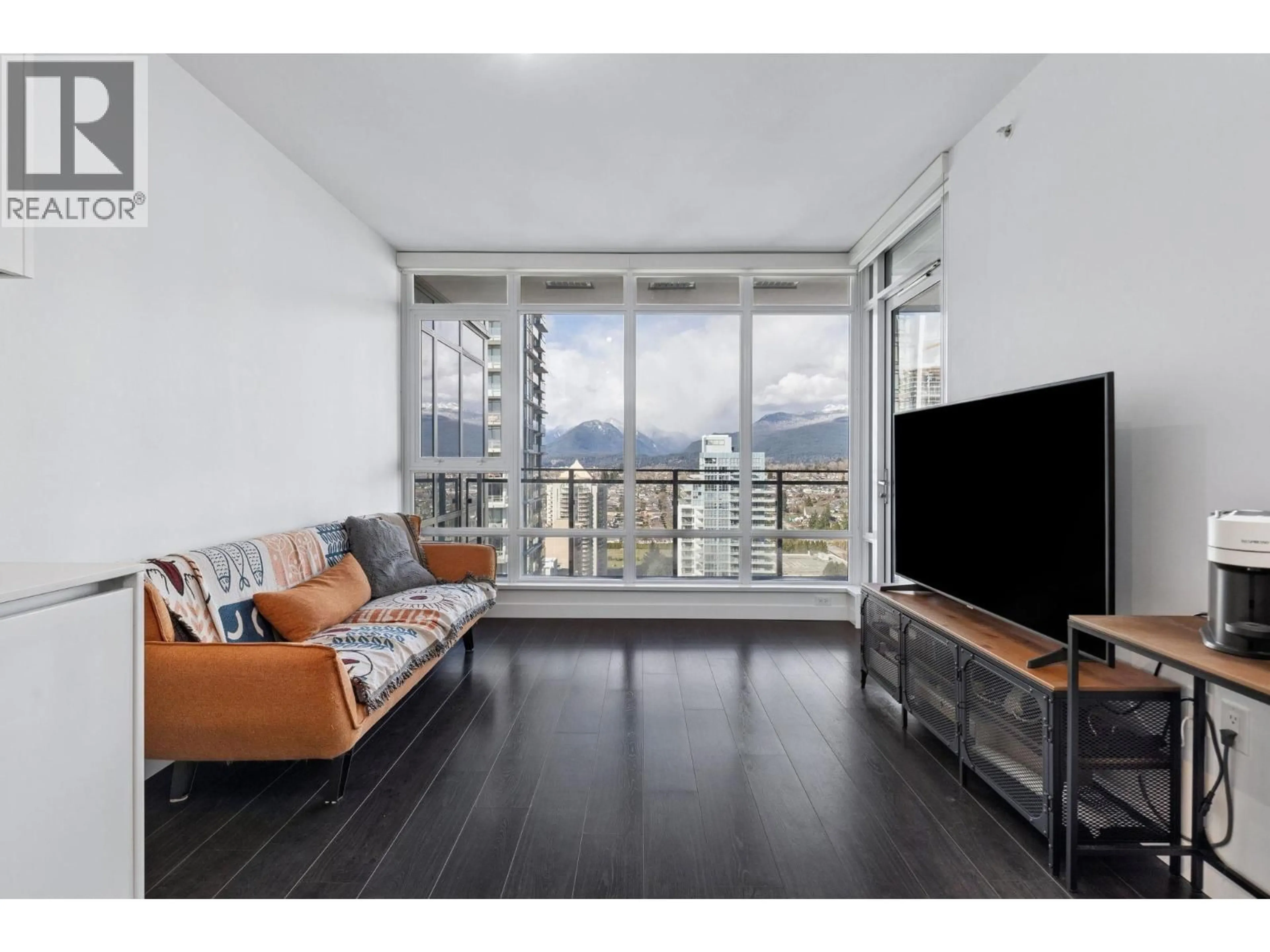 Living room with furniture, wood/laminate floor for 2903 - 2085 SKYLINE COURT, Burnaby British Columbia V5C0M6