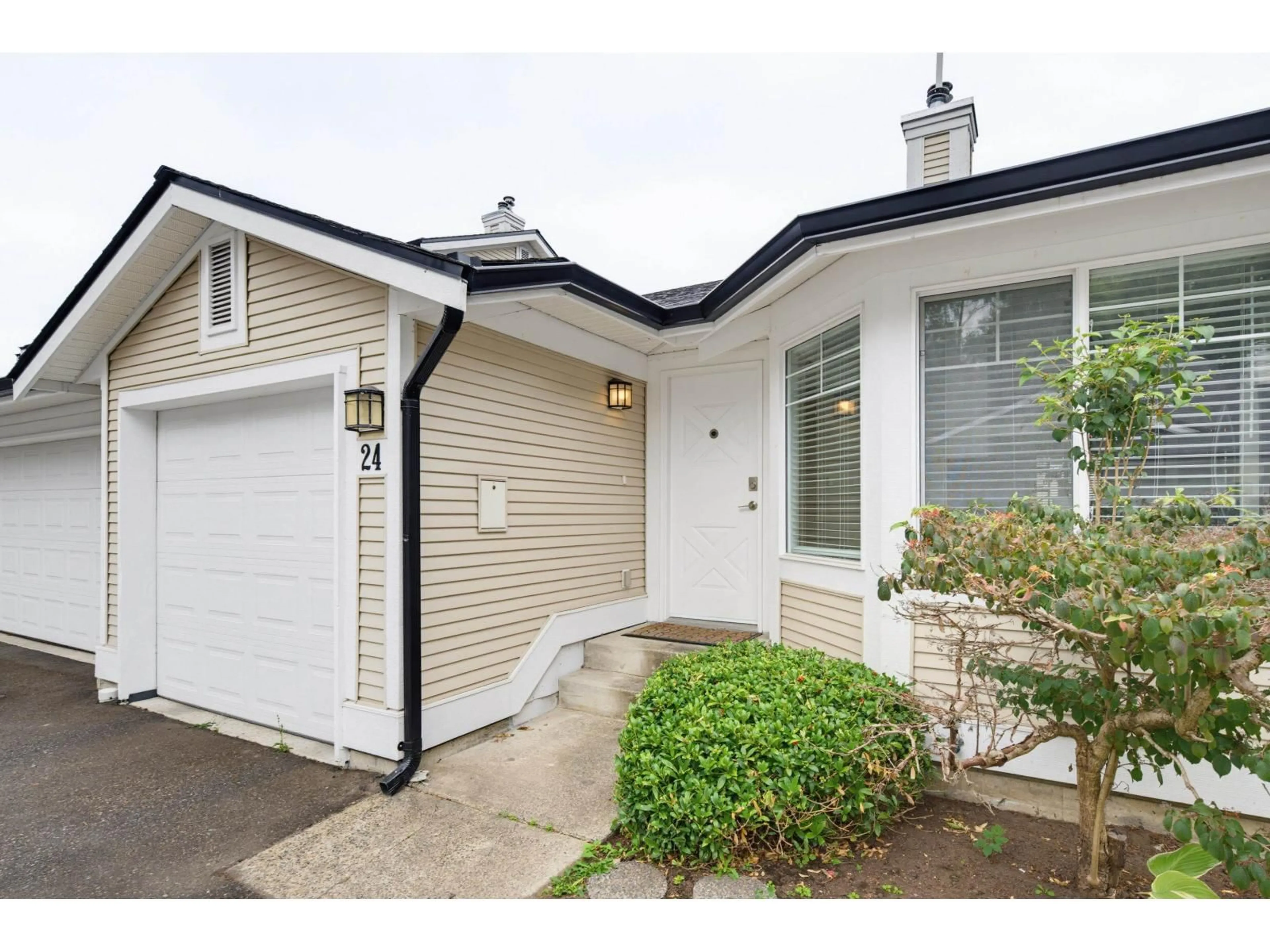 Home with vinyl exterior material, street for 24 - 20761 TELEGRAPH TRAIL, Langley British Columbia V1M2W3
