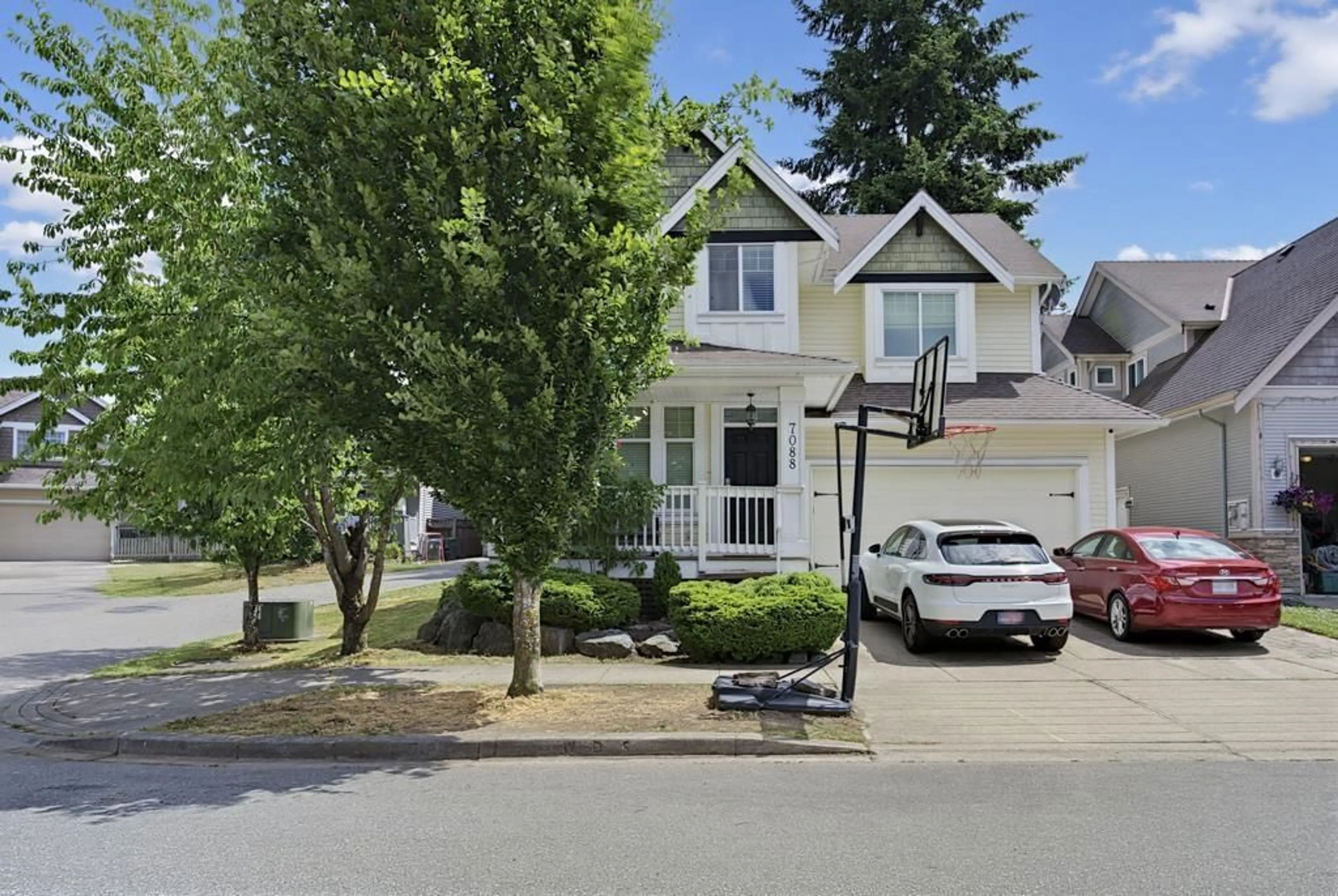 Home with vinyl exterior material, street for 7088 179A STREET, Surrey British Columbia V3S7C7