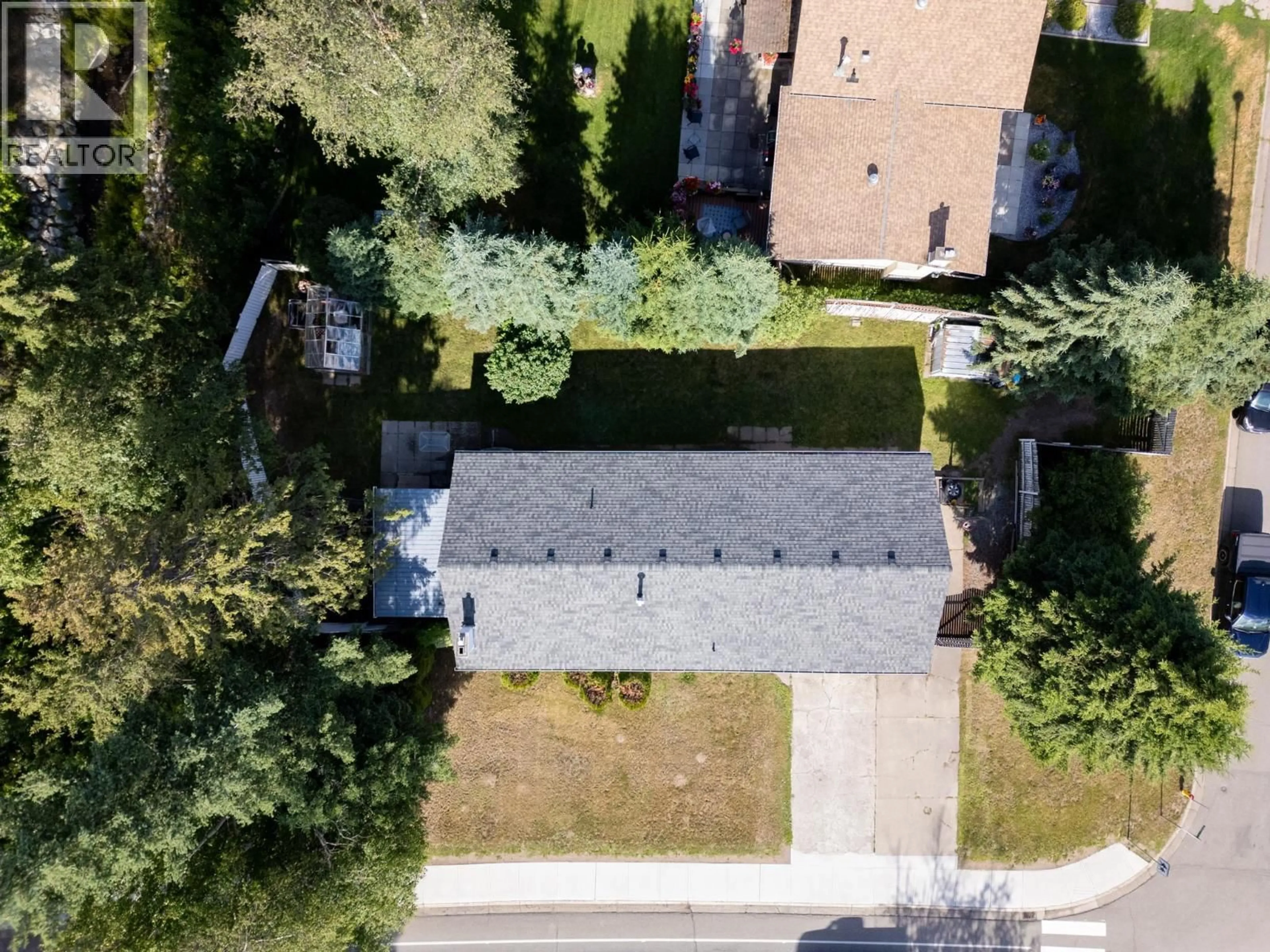A pic from outside/outdoor area/front of a property/back of a property/a pic from drone, street for 5590 SIMON FRASER AVENUE, Prince George British Columbia V2N2C2