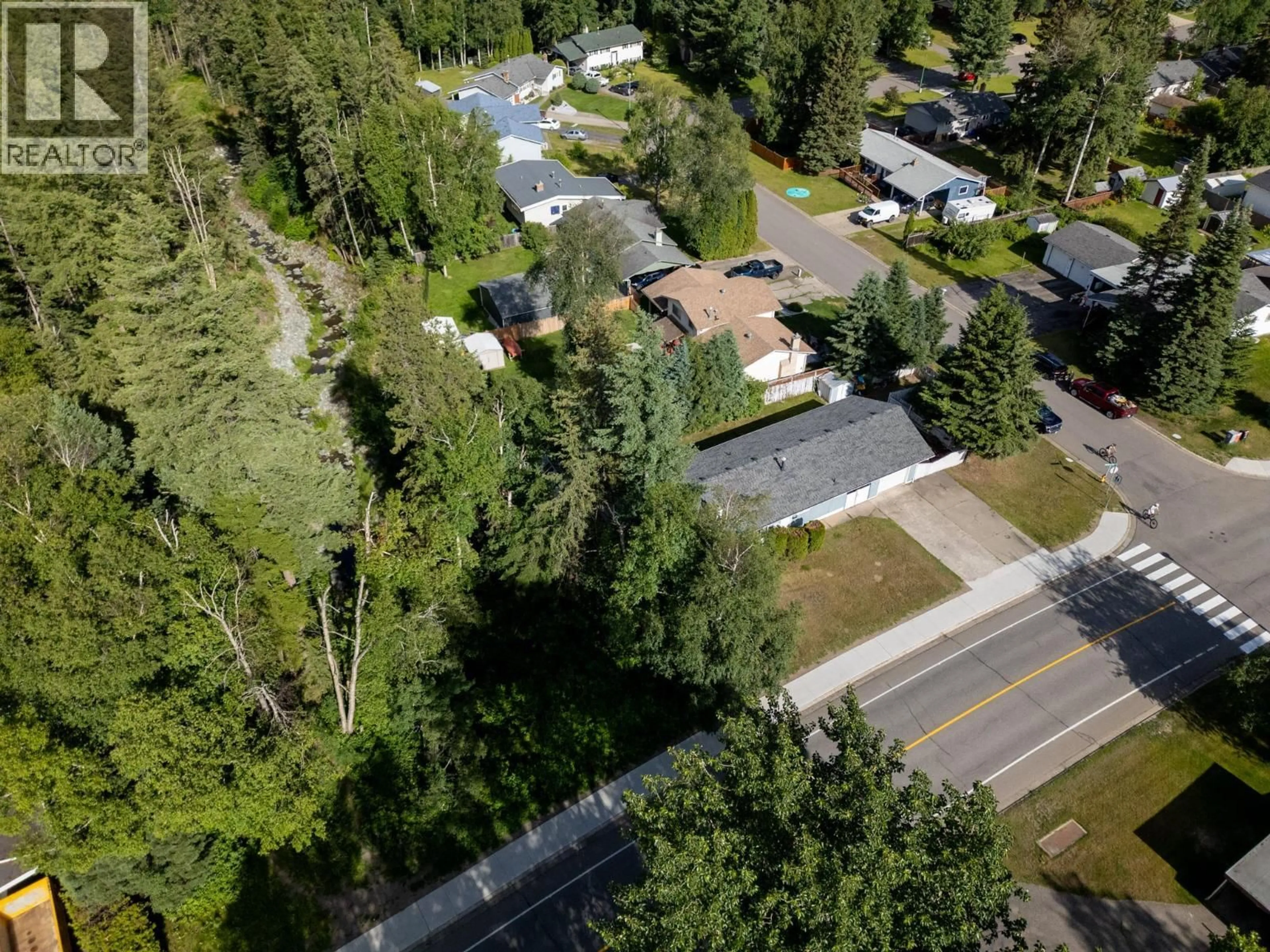A pic from outside/outdoor area/front of a property/back of a property/a pic from drone, street for 5590 SIMON FRASER AVENUE, Prince George British Columbia V2N2C2