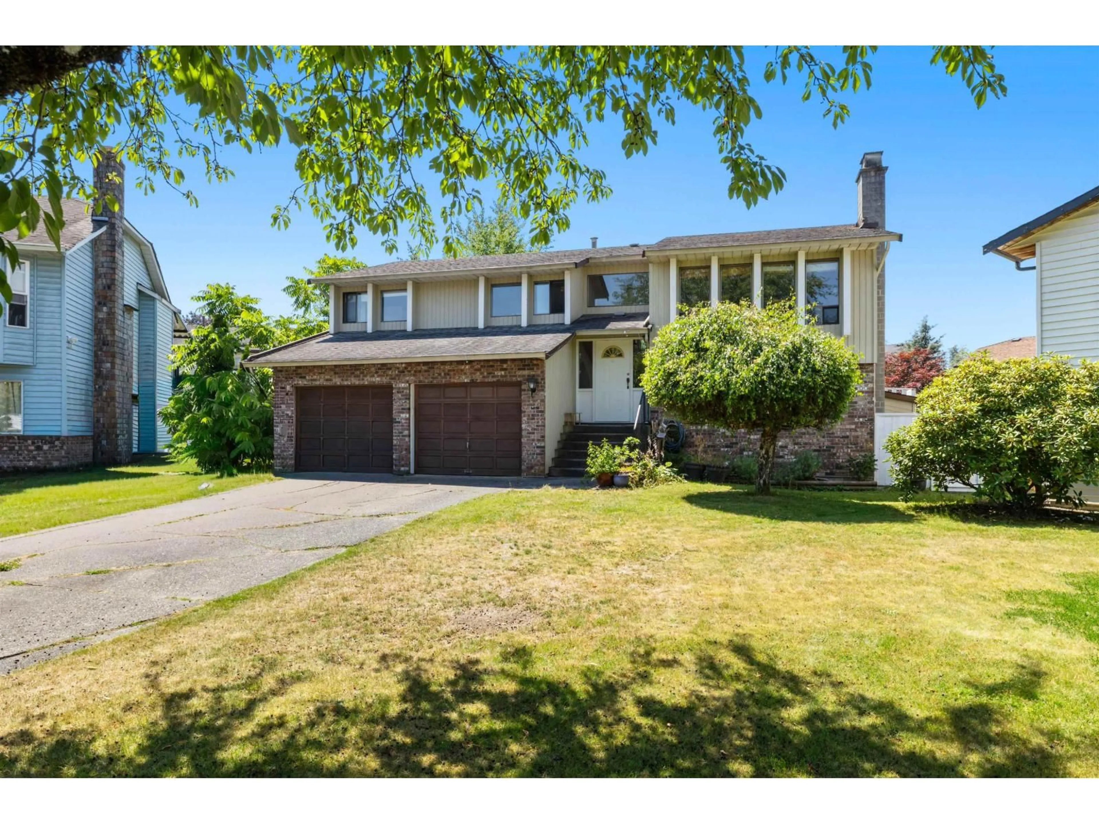 Home with vinyl exterior material, street for 21226 94B AVENUE, Langley British Columbia V1M1M9